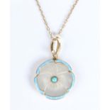 A gold, turquoise, mother-of-pearl and pale blue enamelled pendant, designed as a pansy