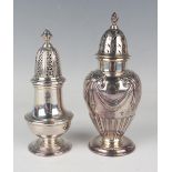 An Elizabeth II silver baluster sugar caster with pierced domed cover, on a circular foot, London