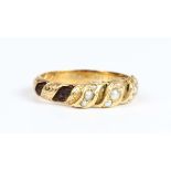 A Victorian gold, seed pearl and hairwork mourning ring, the front with a triple scroll motif,