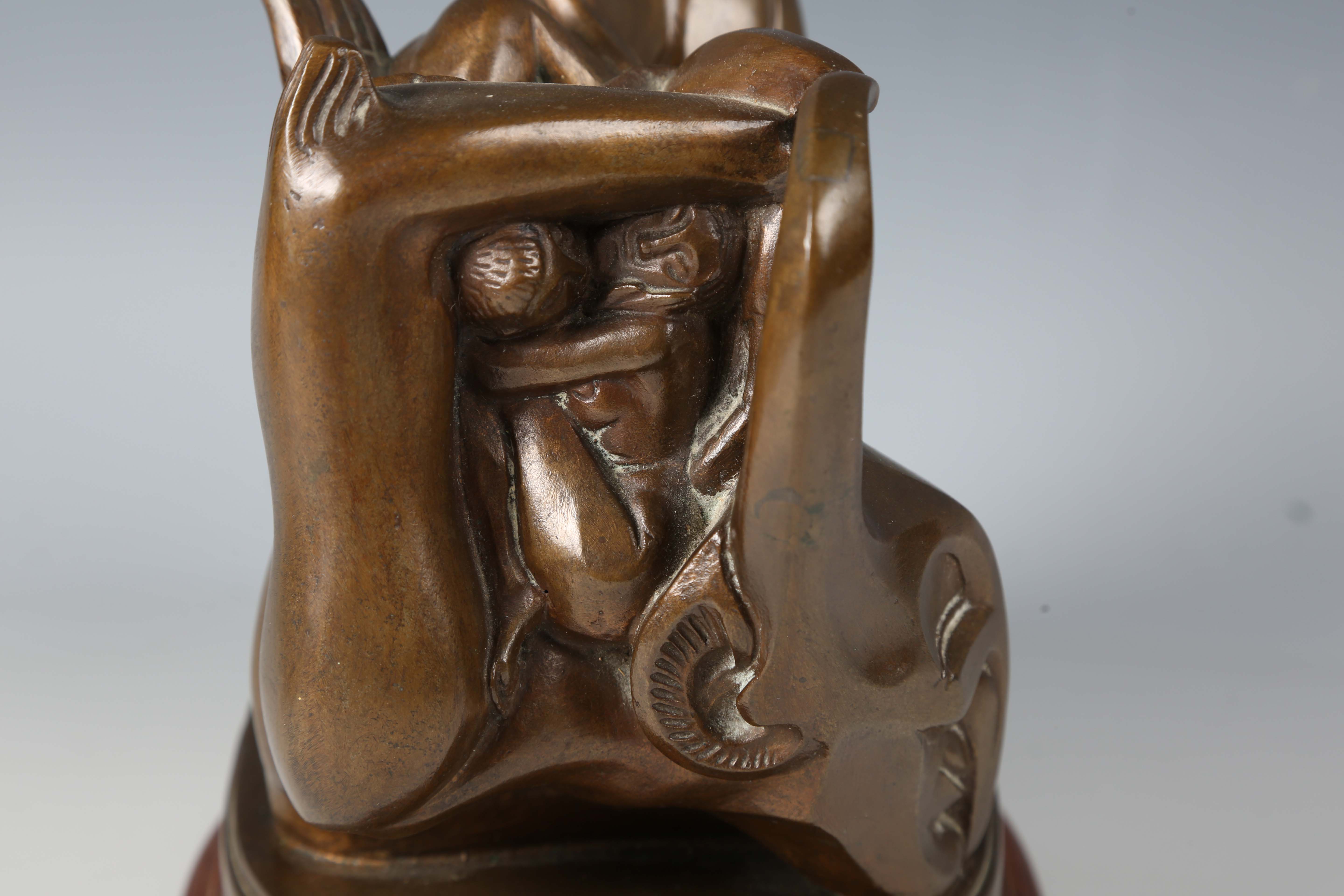 A mid-20th century brown patinated cast bronze contorted figure group depicting the Devil enveloping - Image 3 of 8