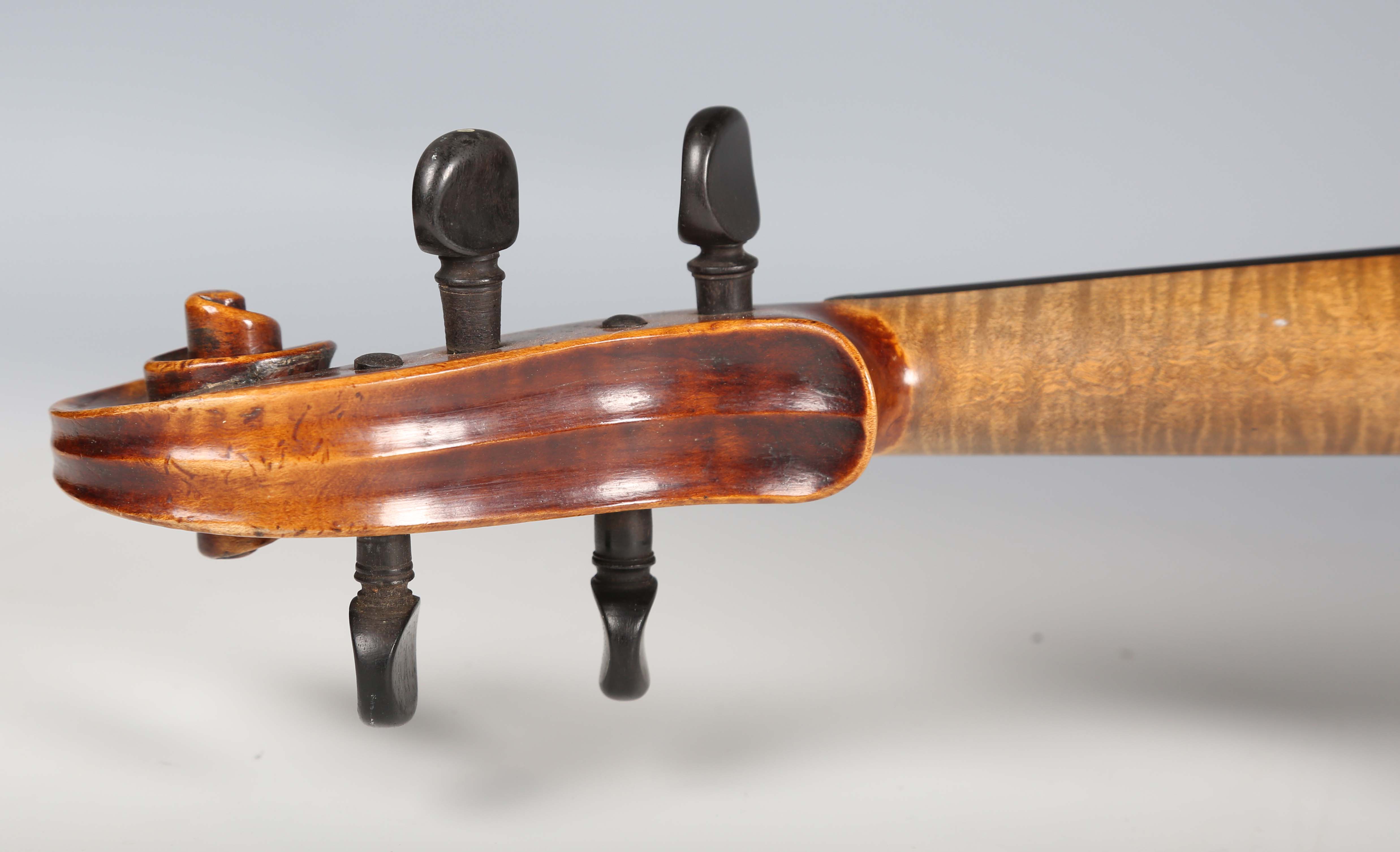 A violin with striped two-piece back, bearing interior label detailed 'Antonius Stradivarius...', - Image 13 of 24