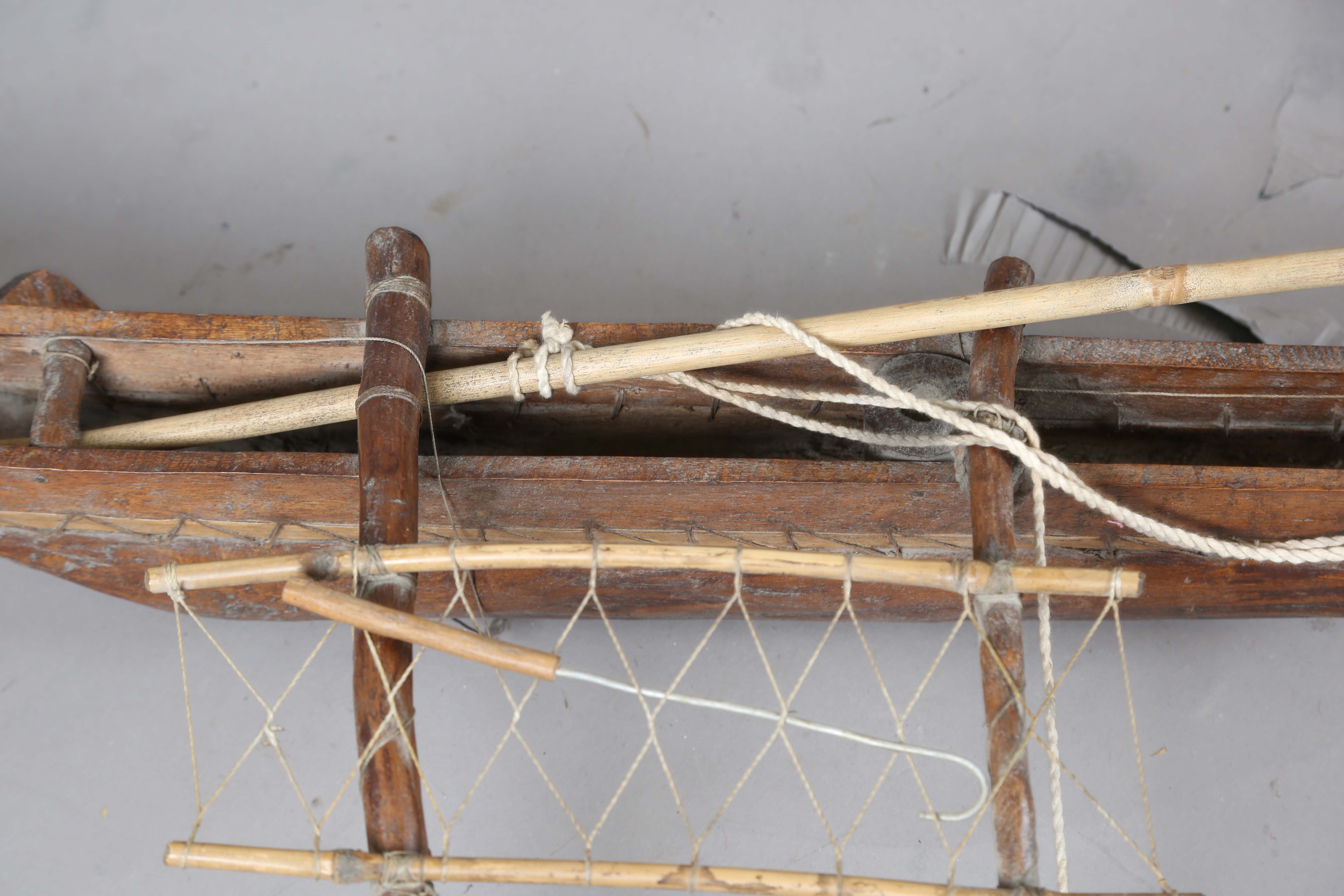 An early 20th century scratch-built softwood model of a boat, detailed with two brass cannons and - Image 5 of 13