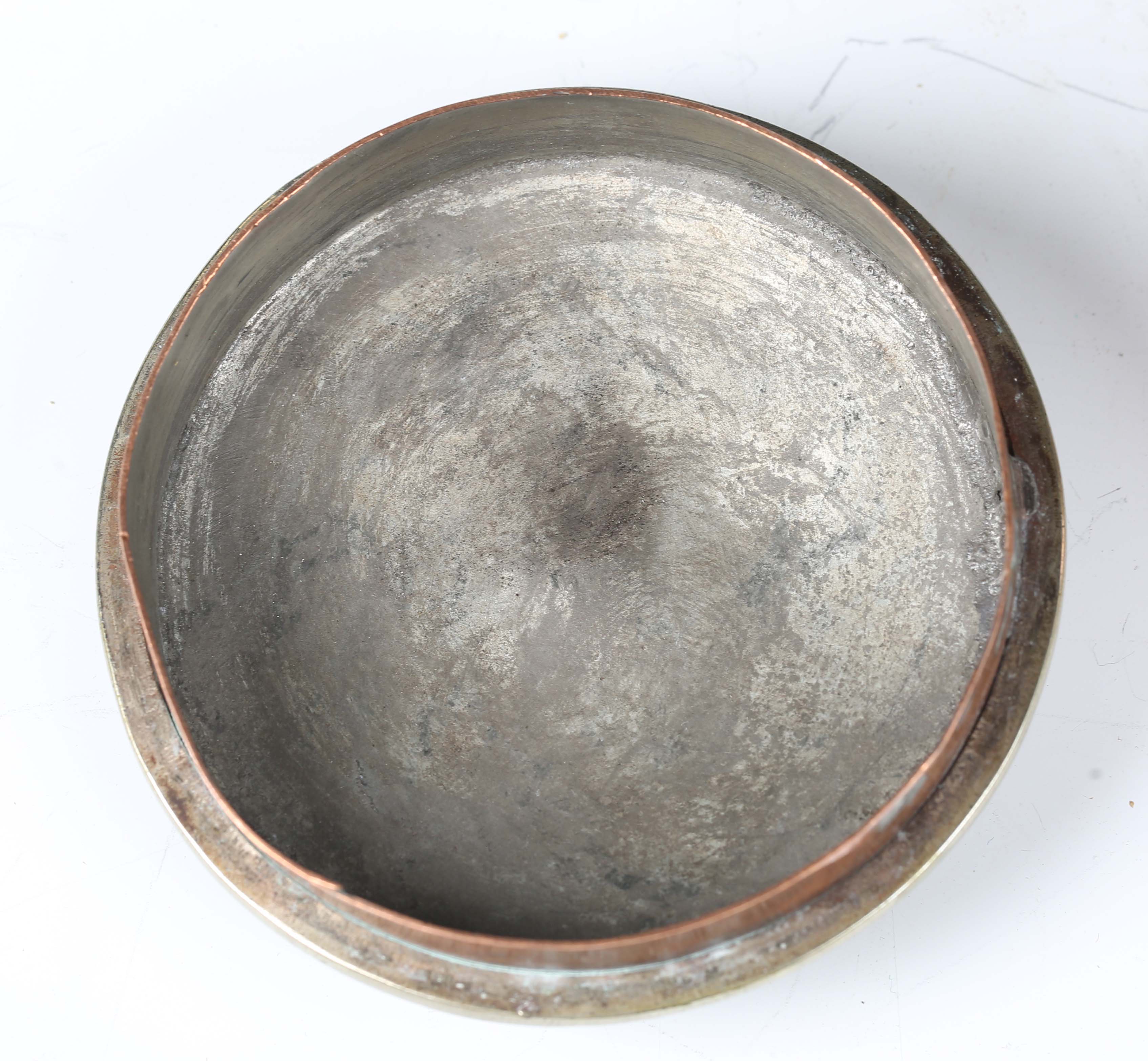 A 20th century Tibetan copper and nickel mounted cylindrical jar and cover, the lid inset with - Image 4 of 8