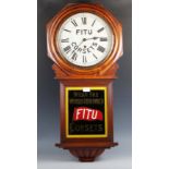 A late 19th century walnut cased Fitu Corsets advertising wall clock, the painted dial and glazed