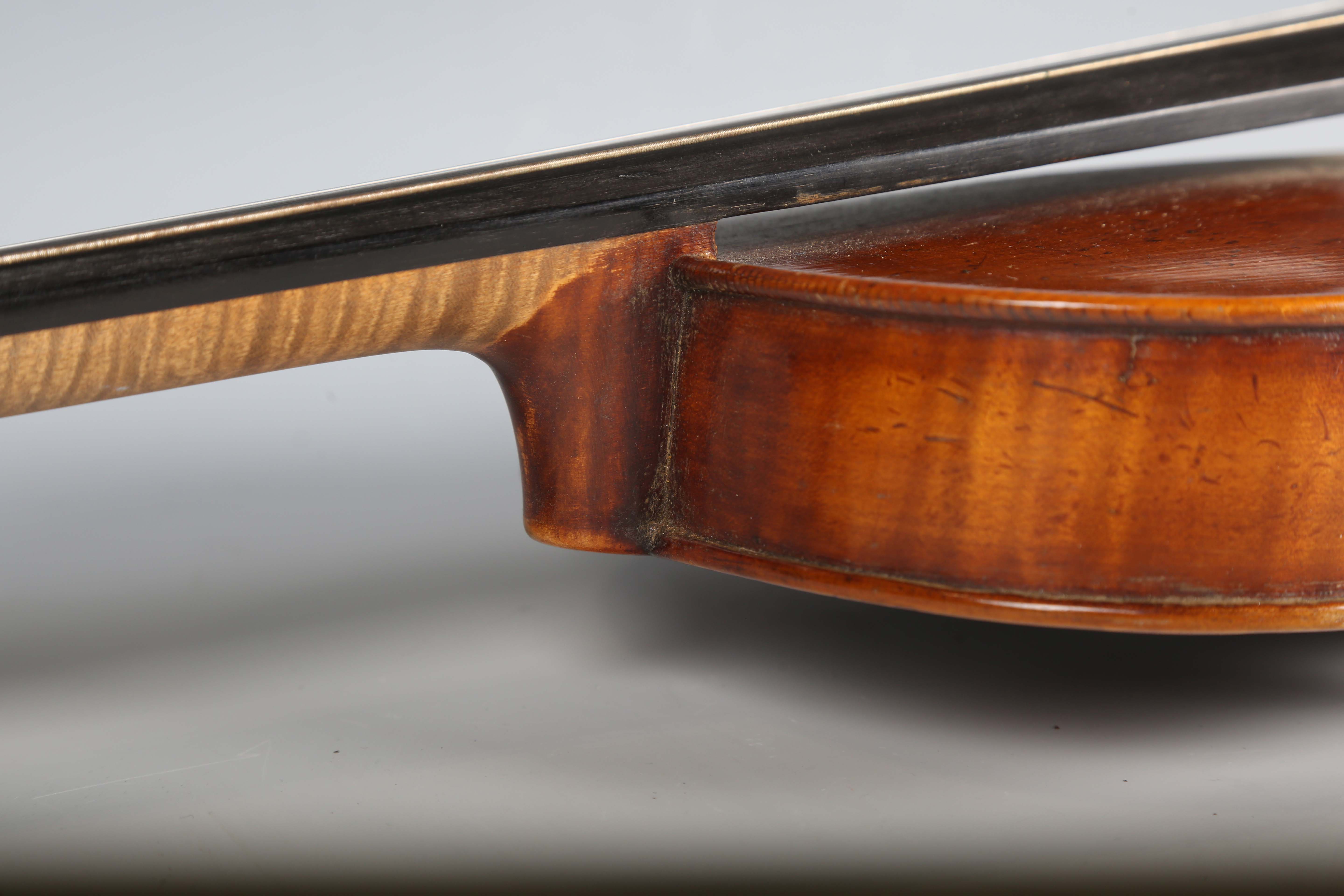 A violin with striped two-piece back, bearing interior label detailed 'Antonius Stradivarius...', - Image 17 of 24