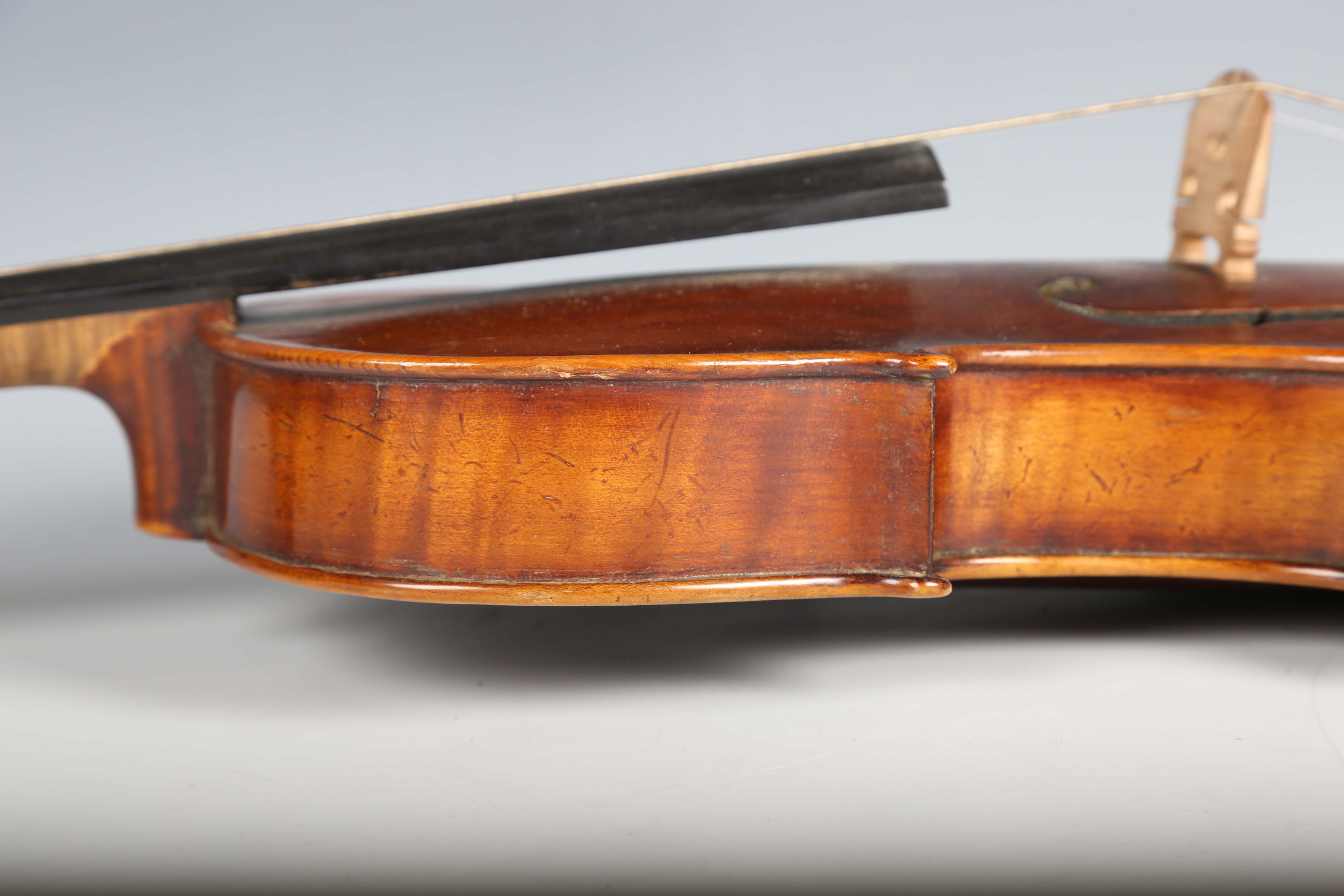 A violin with striped two-piece back, bearing interior label detailed 'Antonius Stradivarius...', - Image 16 of 24