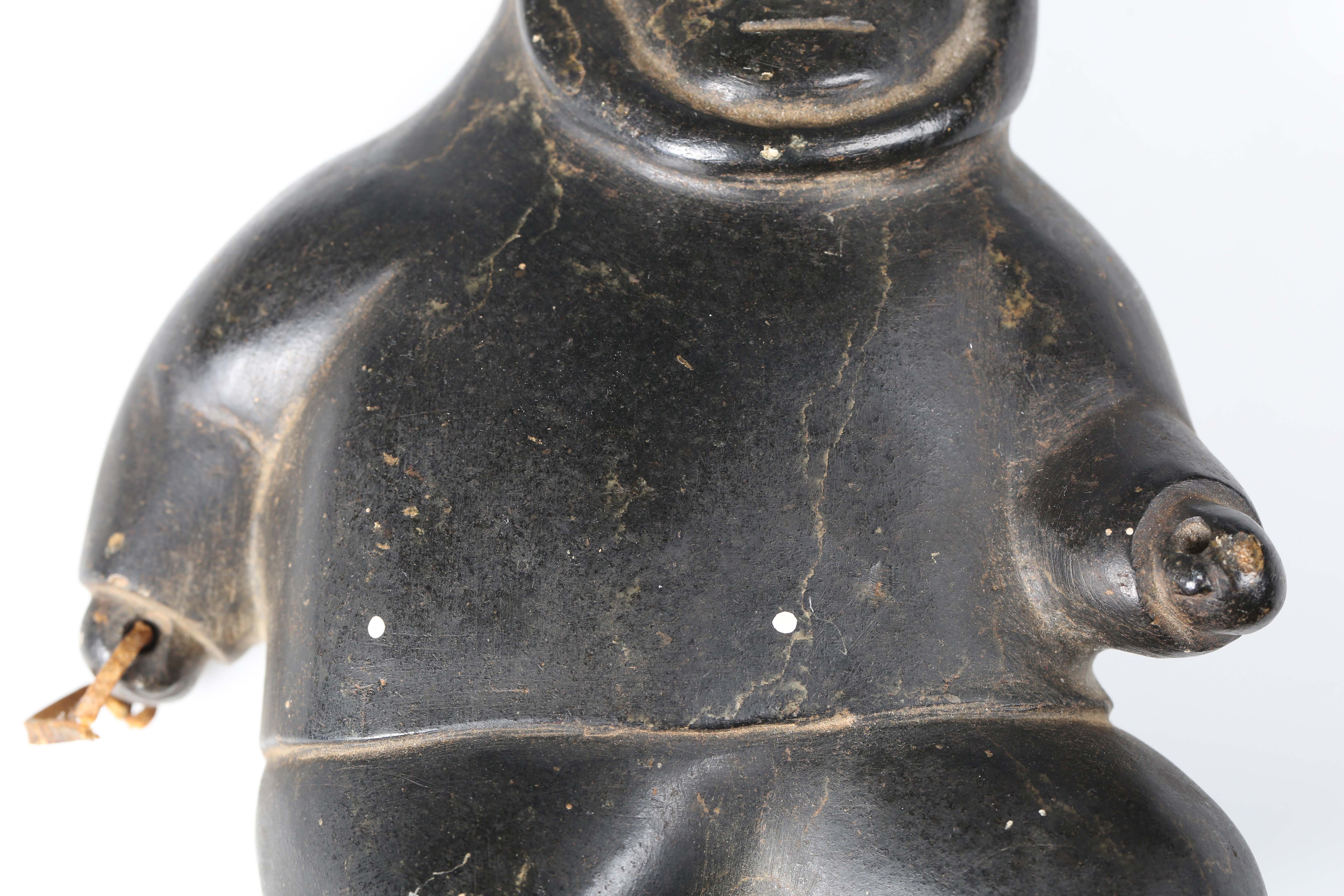 Two Inuit carved black stone figures, one modelled as an Inuit, height 19cm, the other as a - Image 6 of 13