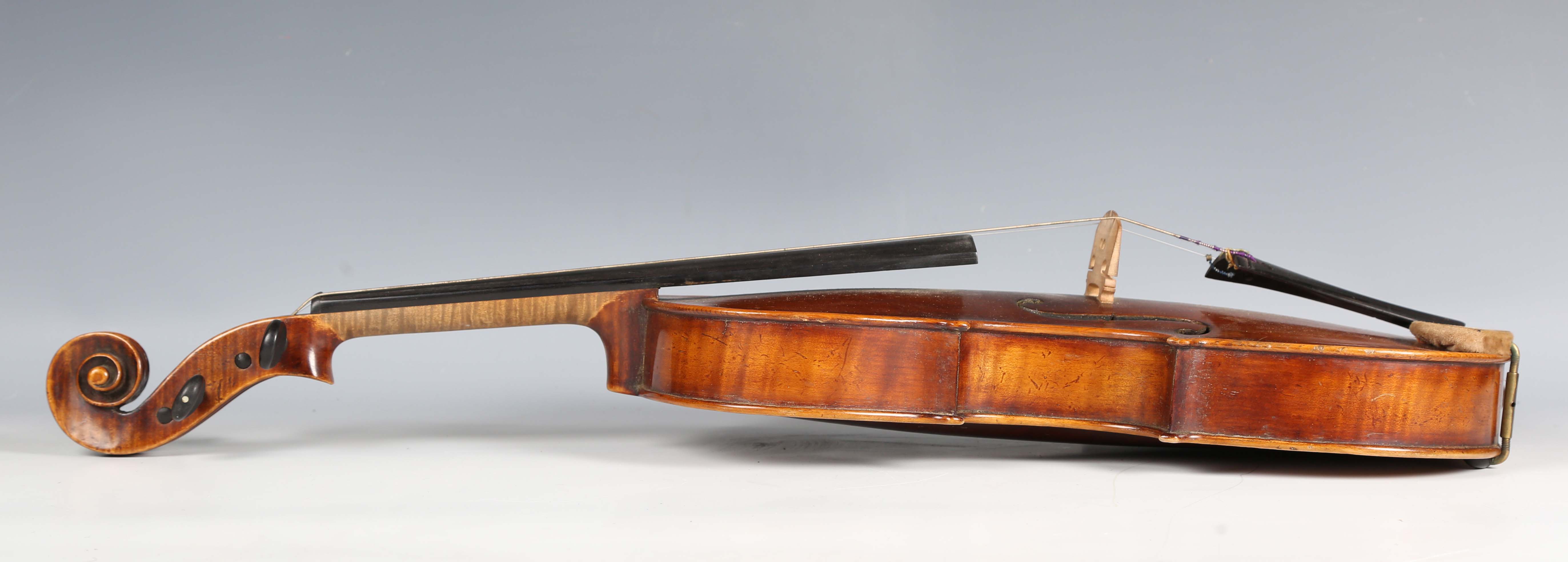 A violin with striped two-piece back, bearing interior label detailed 'Antonius Stradivarius...', - Image 20 of 24