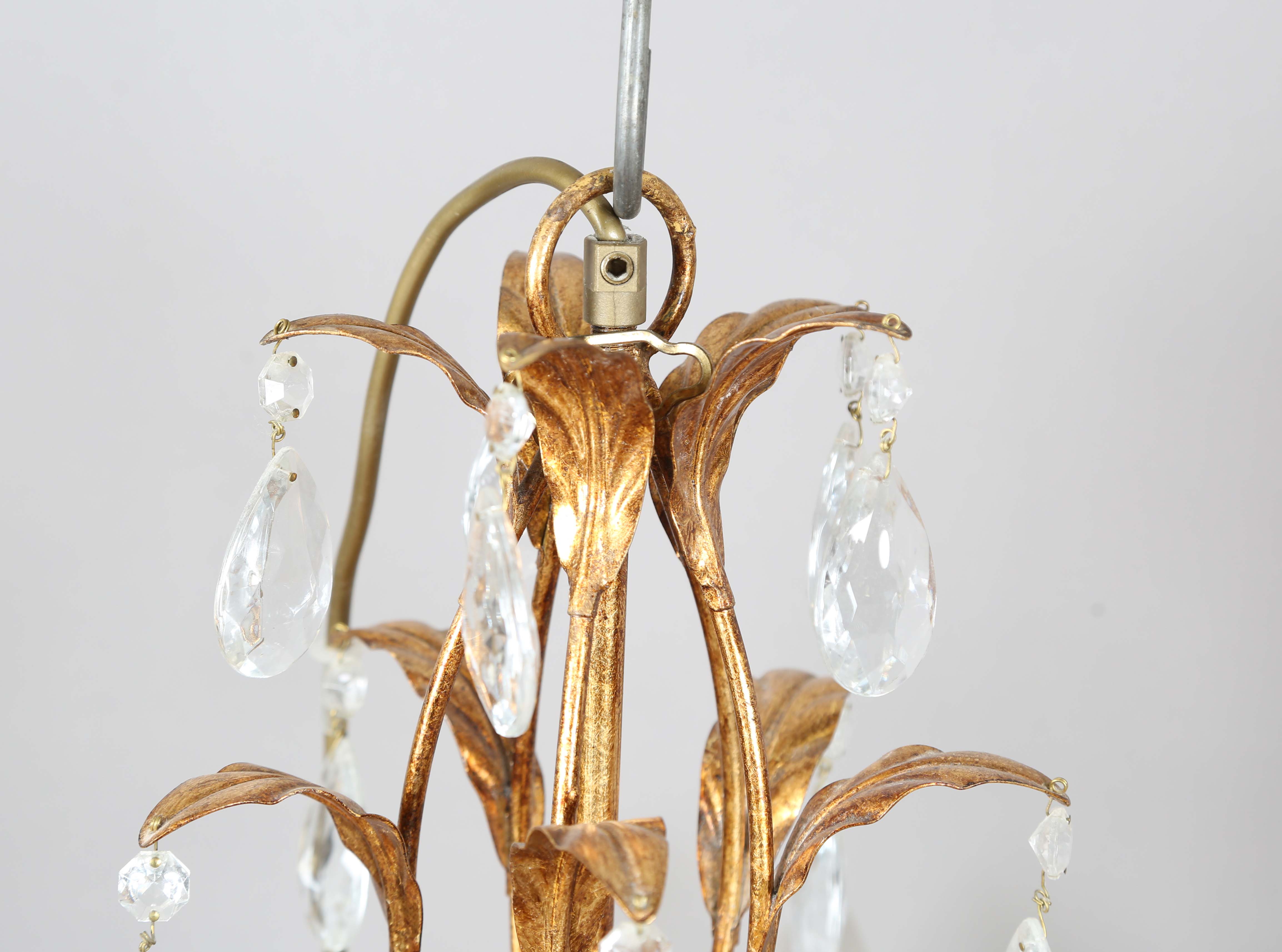 A 20th century gilt metal and cut glass five-light chandelier, height 60cm, width 55cm.Buyer’s - Image 9 of 9