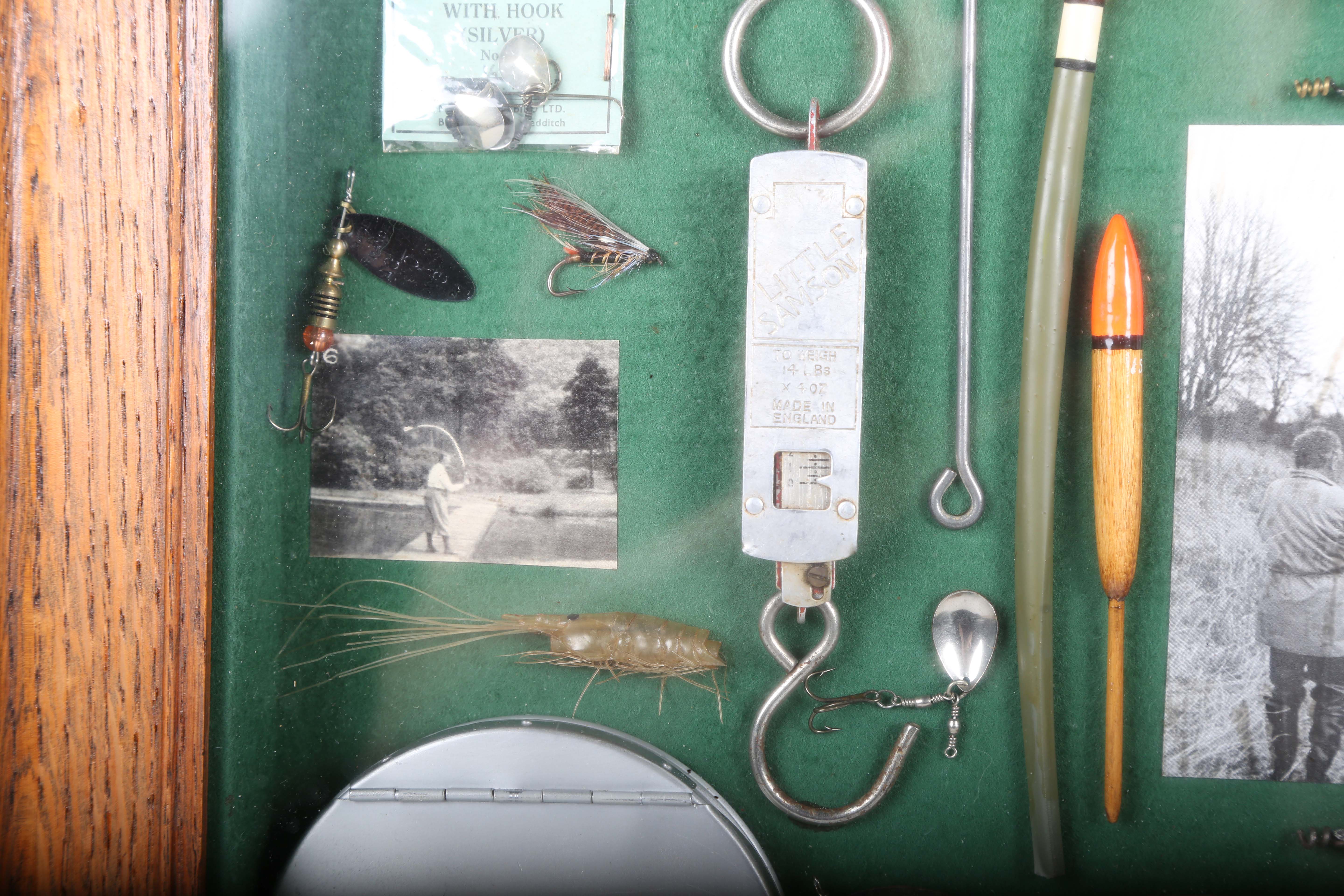 A group of fishing related items, including lures, floats, flies and hooks, all mounted for - Image 7 of 12