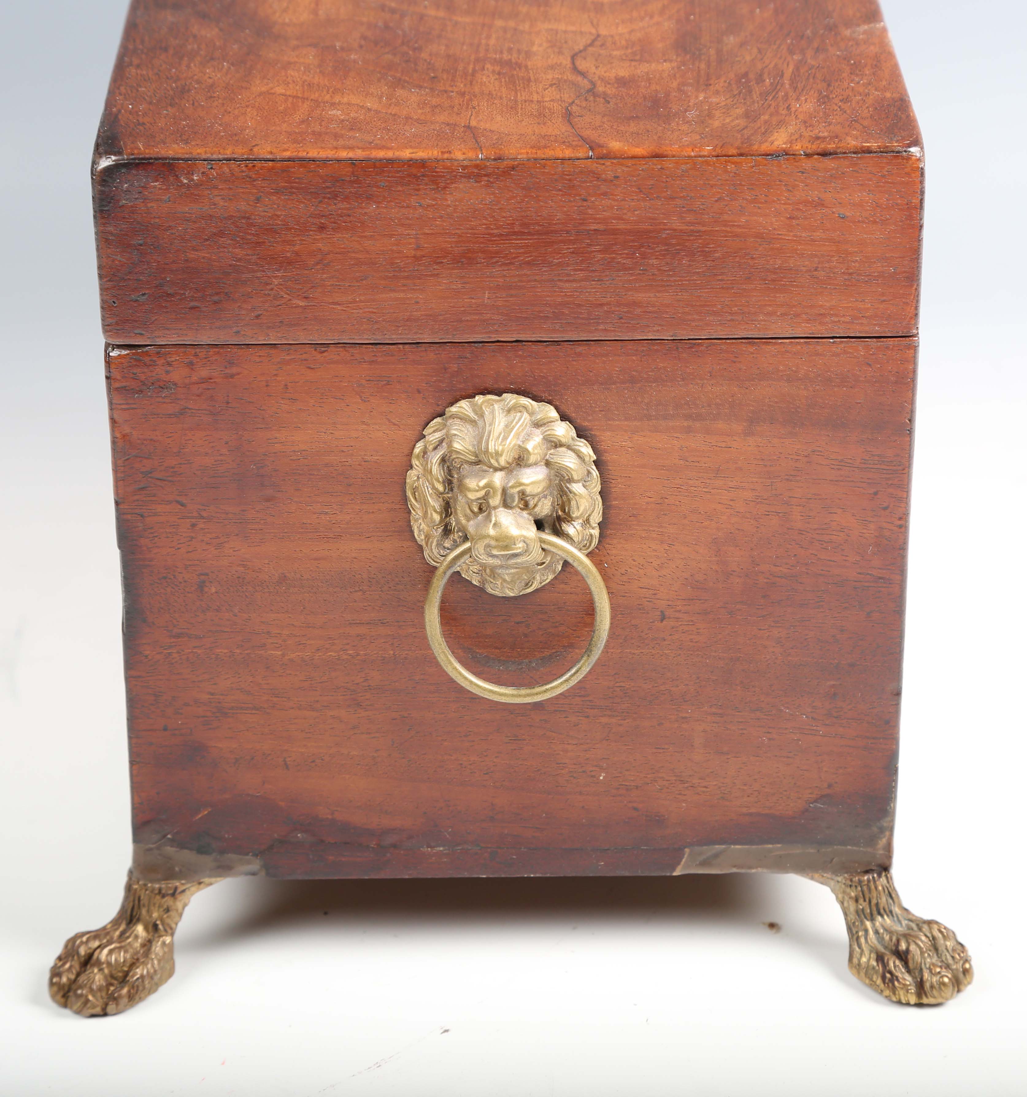 A Regency figured mahogany tea caddy with lion mask ring handles and claw feet, width 34cm.Buyer’s - Image 7 of 12