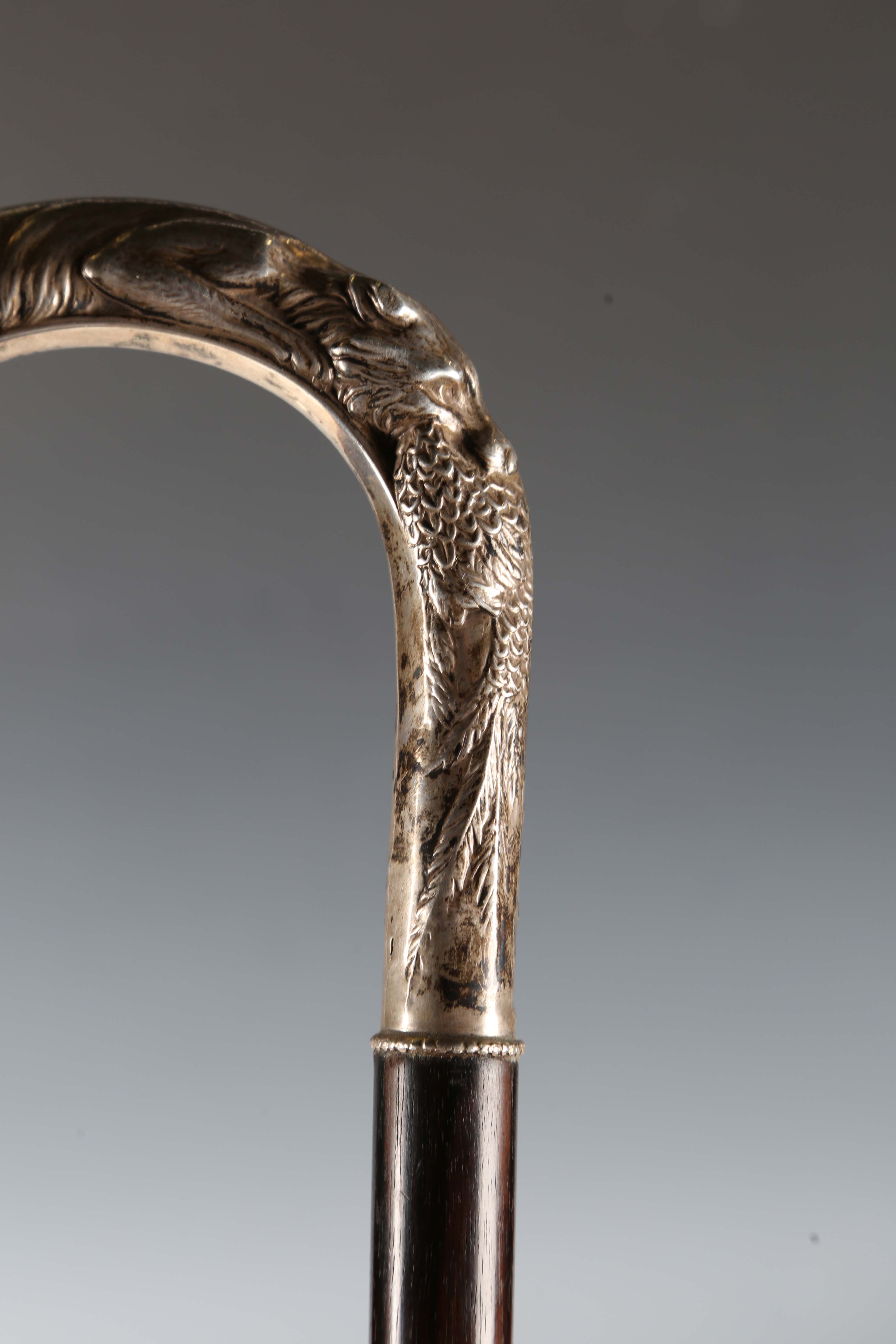 A late 20th century hardwood walking stick, the silver handle decorated in relief with a fox and - Image 8 of 11