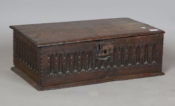 A 17th century oak box with carved fluted sides, height 19cm, width 58cm, depth 35cm.Buyer’s Premium