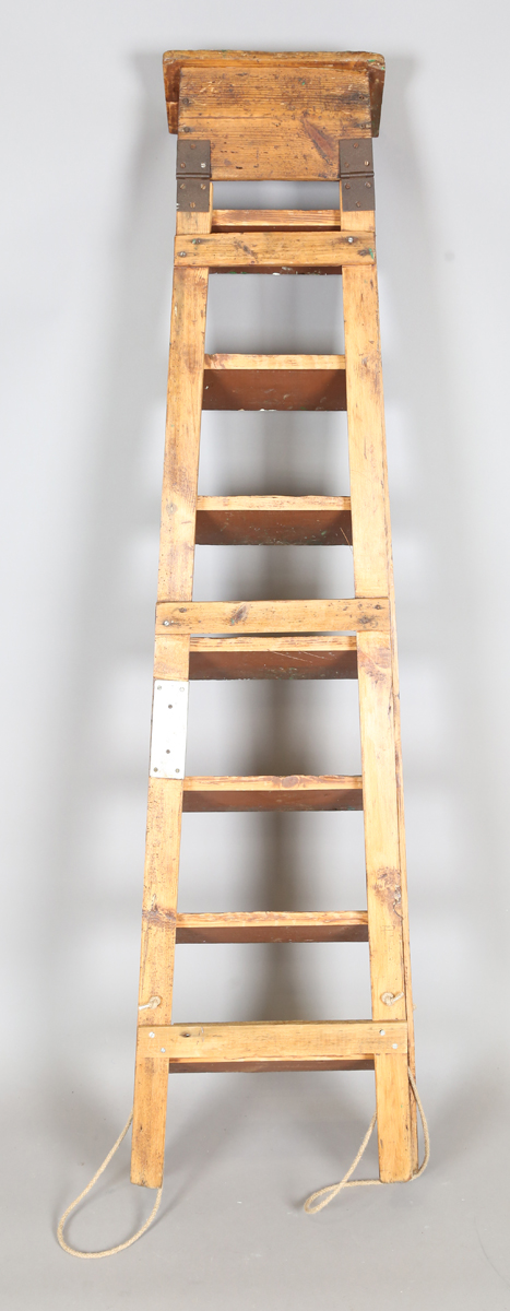 A mid-20th century stained pine eight-rung step ladder, height 167cm, width 35cm.Buyer’s Premium - Image 2 of 9