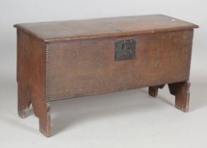 A Charles II oak six-plank boarded coffer, the lid with original wire hinges, height 53.5cm, width