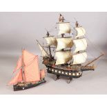 A 20th century scratch-built wooden model of a galleon, length 110cm, together with a model of a