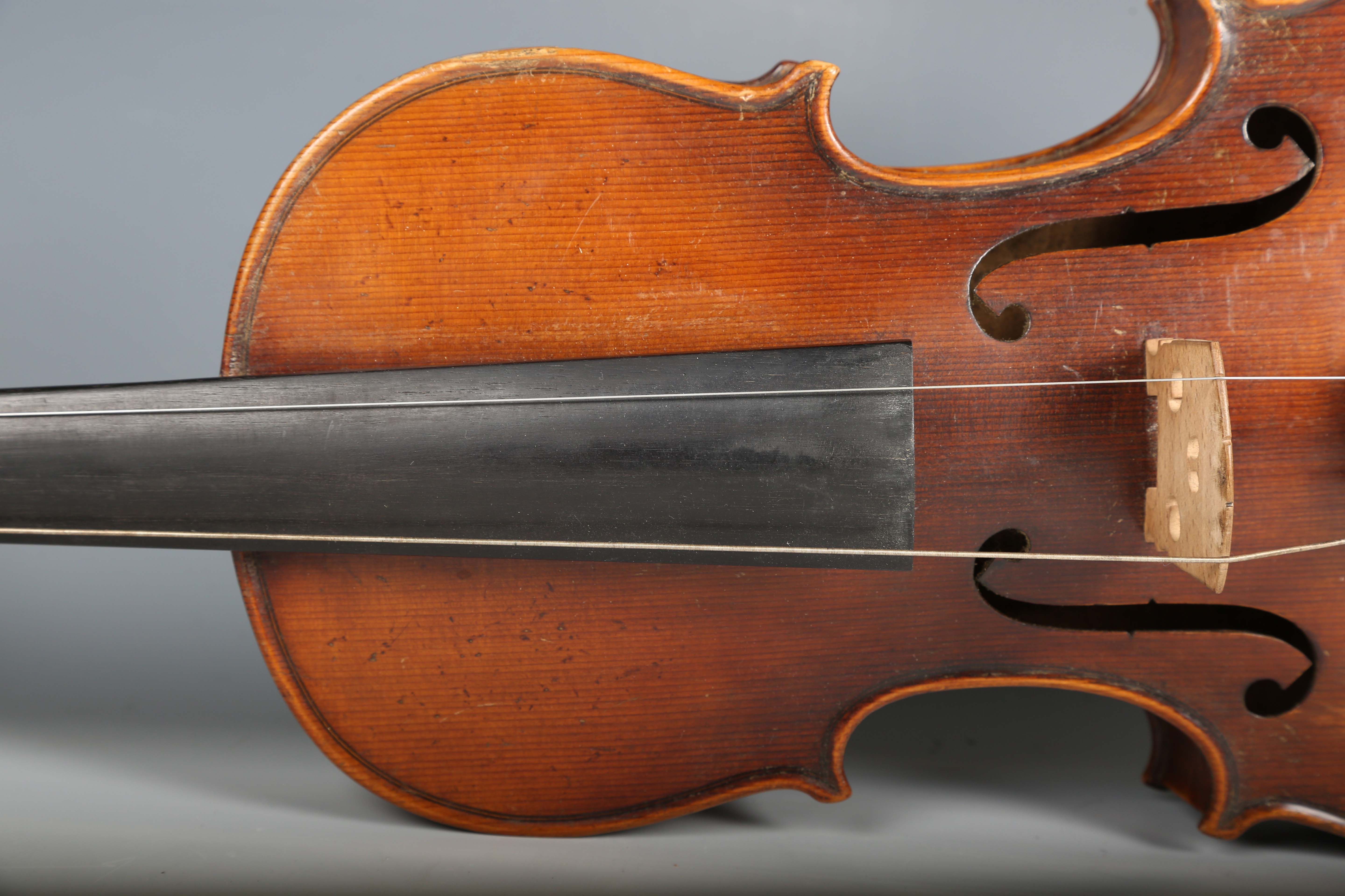 A violin with striped two-piece back, bearing interior label detailed 'Antonius Stradivarius...', - Image 22 of 24