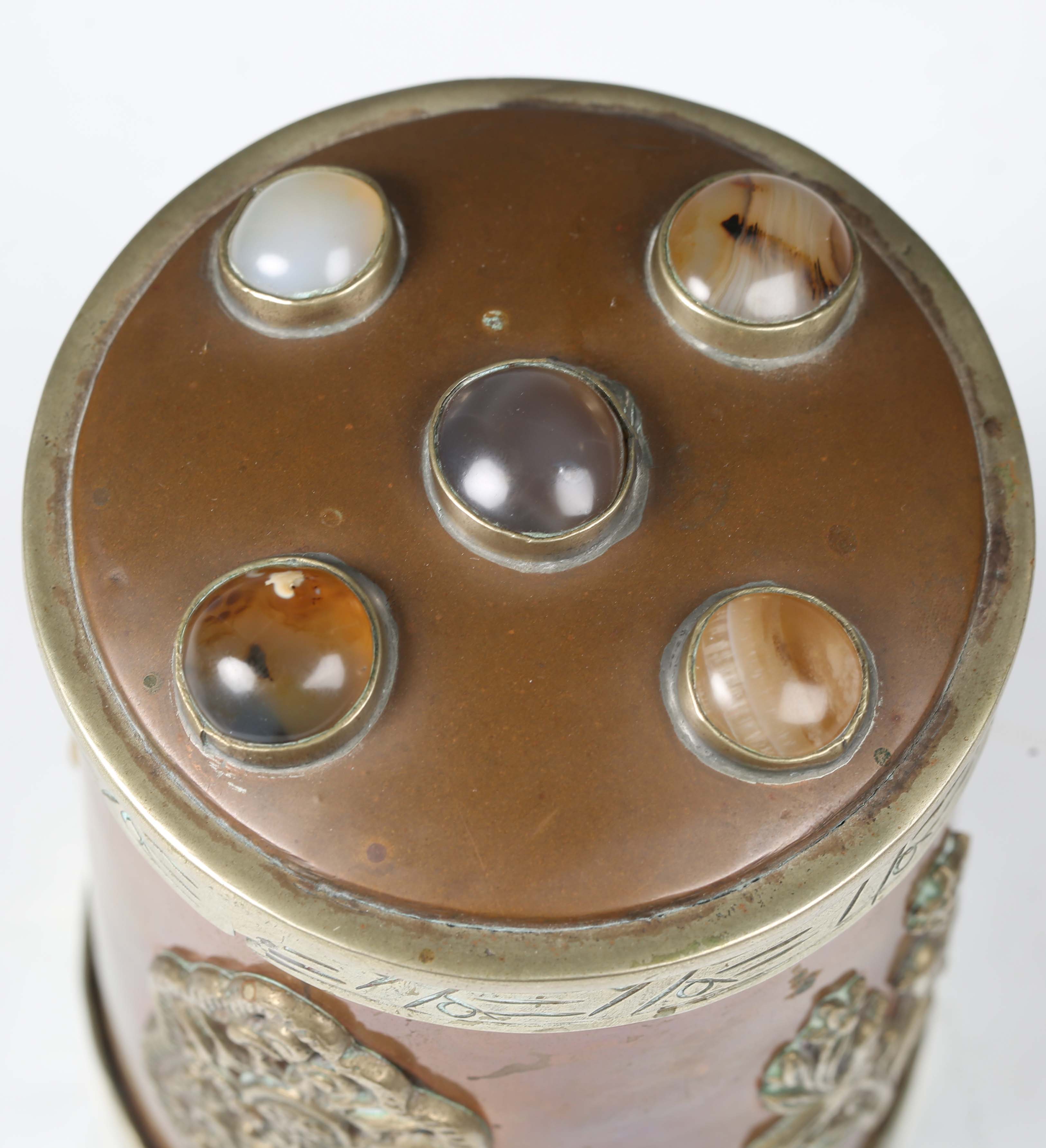 A 20th century Tibetan copper and nickel mounted cylindrical jar and cover, the lid inset with - Image 5 of 8