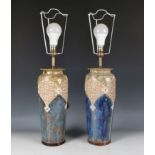 A pair of Royal Doulton stoneware vases, later converted to table lamps, heights 62cm.