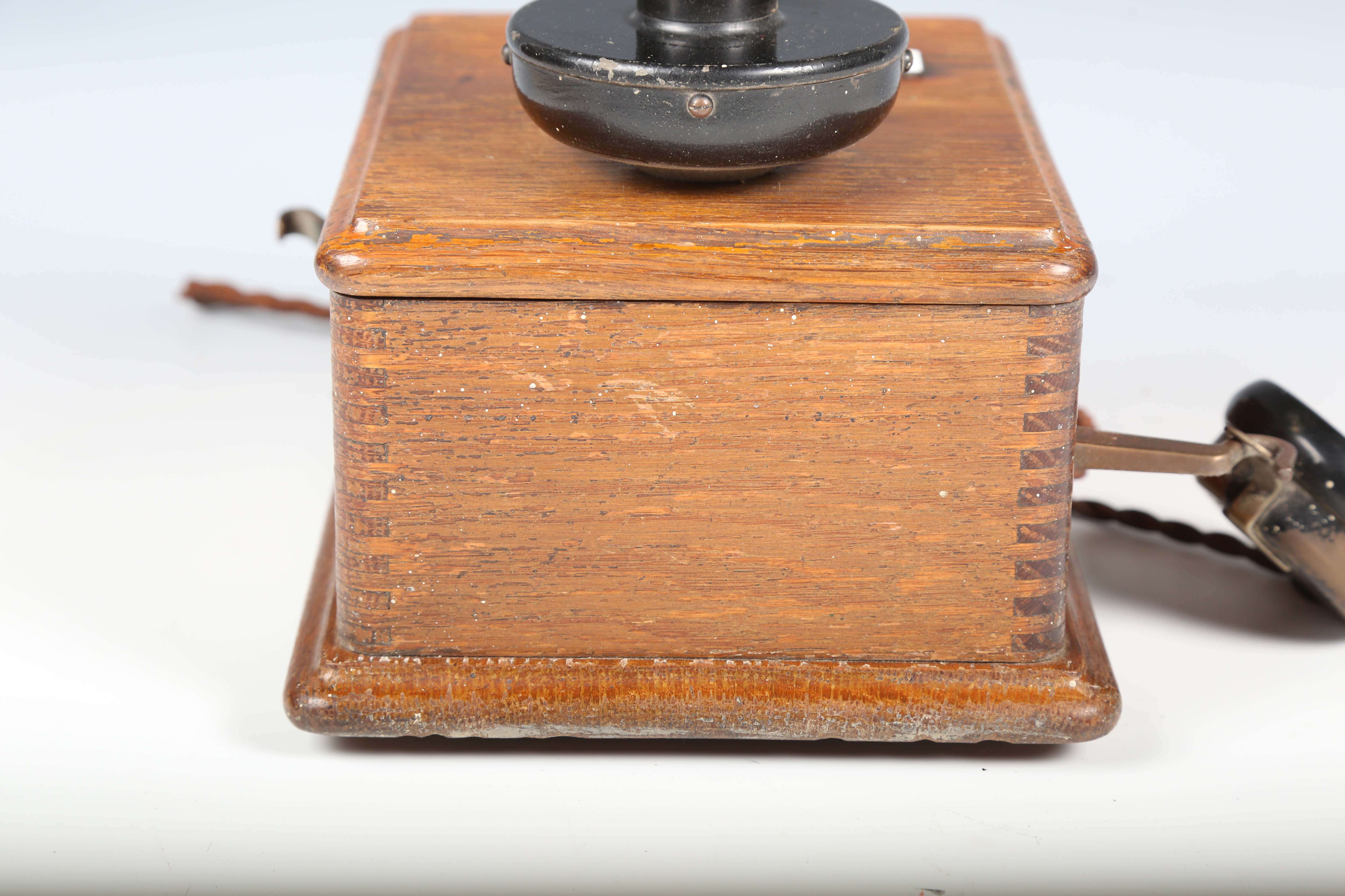 An early 20th century oak cased wall telephone, possibly from a railway, the front with applied - Image 3 of 10