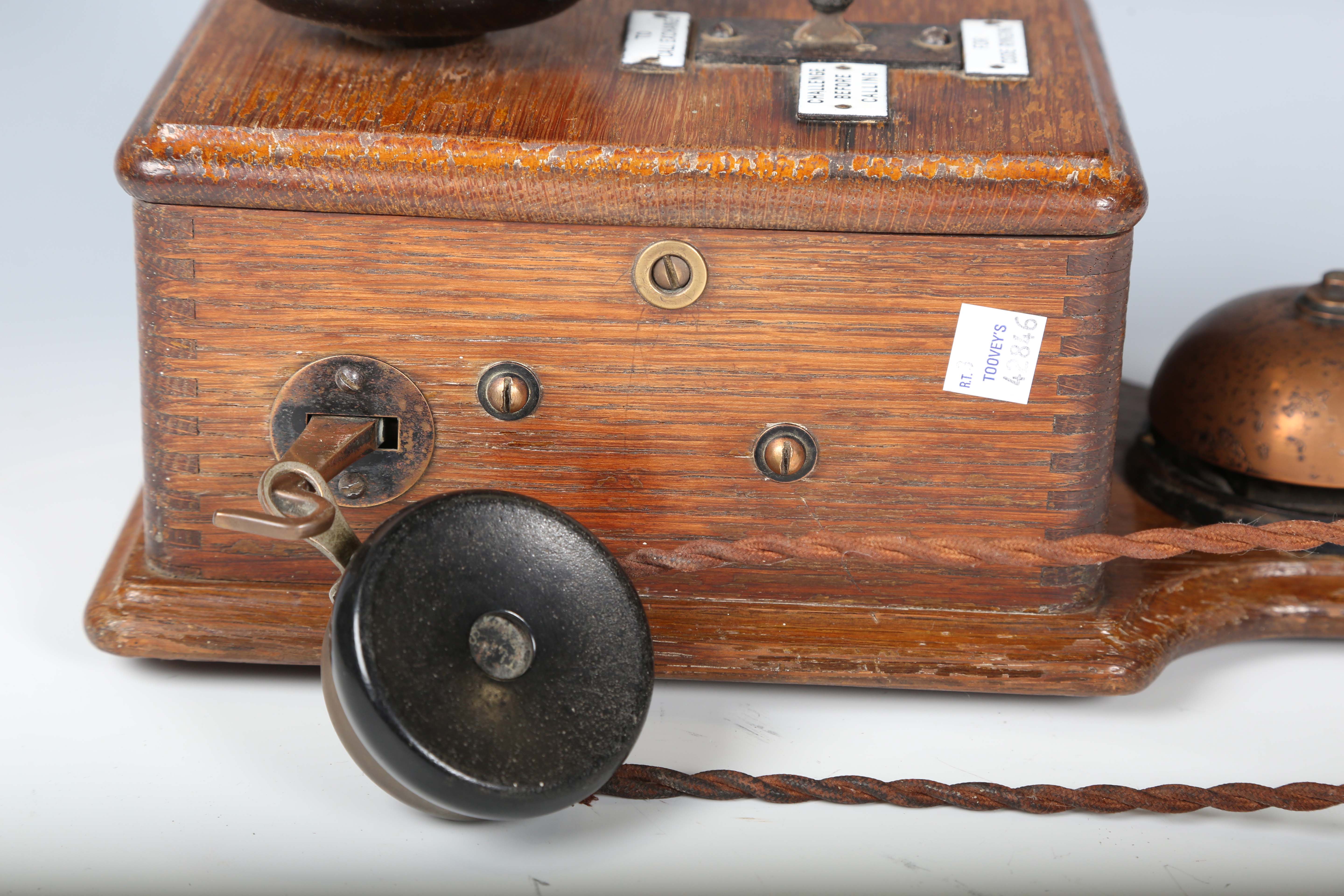 An early 20th century oak cased wall telephone, possibly from a railway, the front with applied - Image 6 of 10