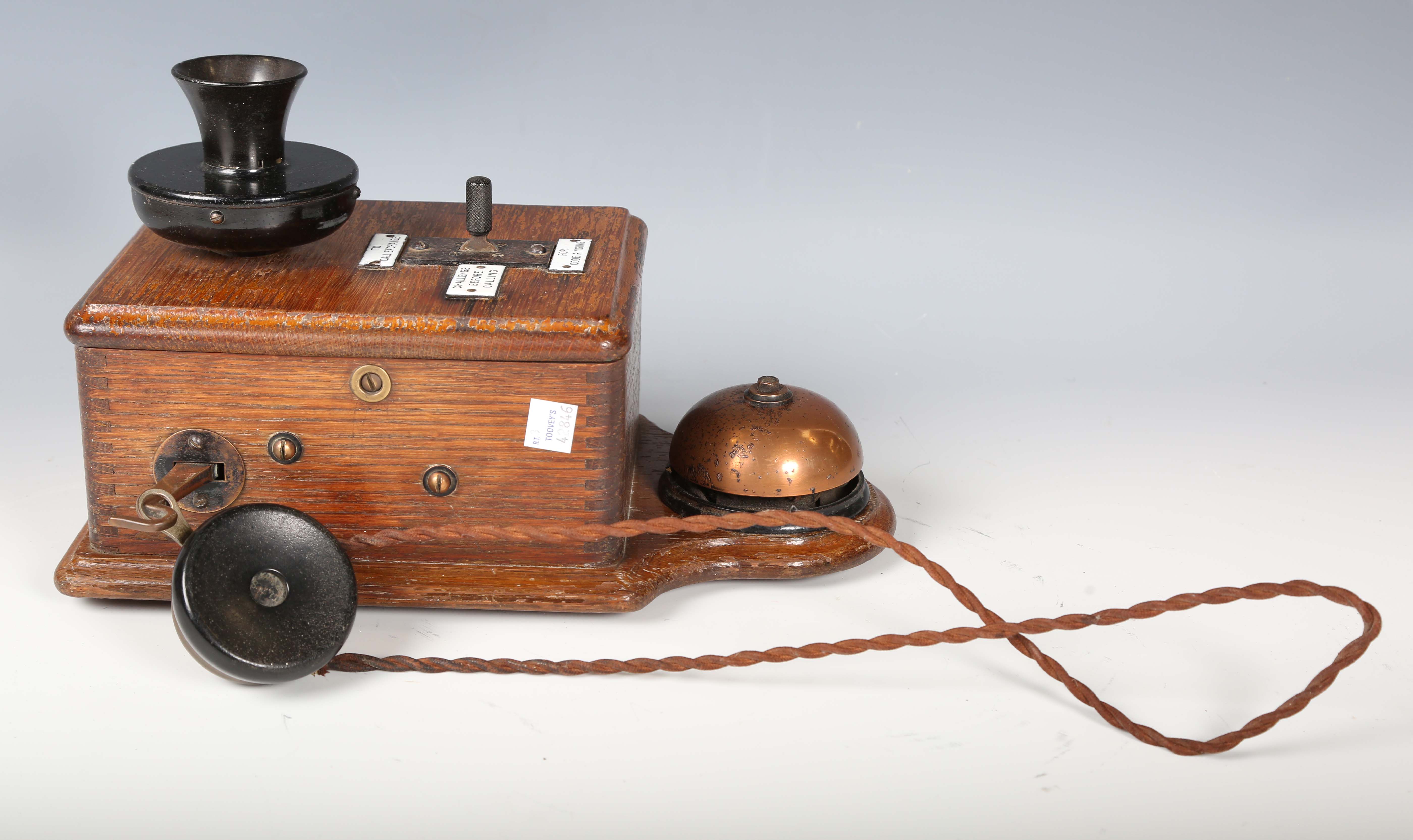 An early 20th century oak cased wall telephone, possibly from a railway, the front with applied - Image 7 of 10