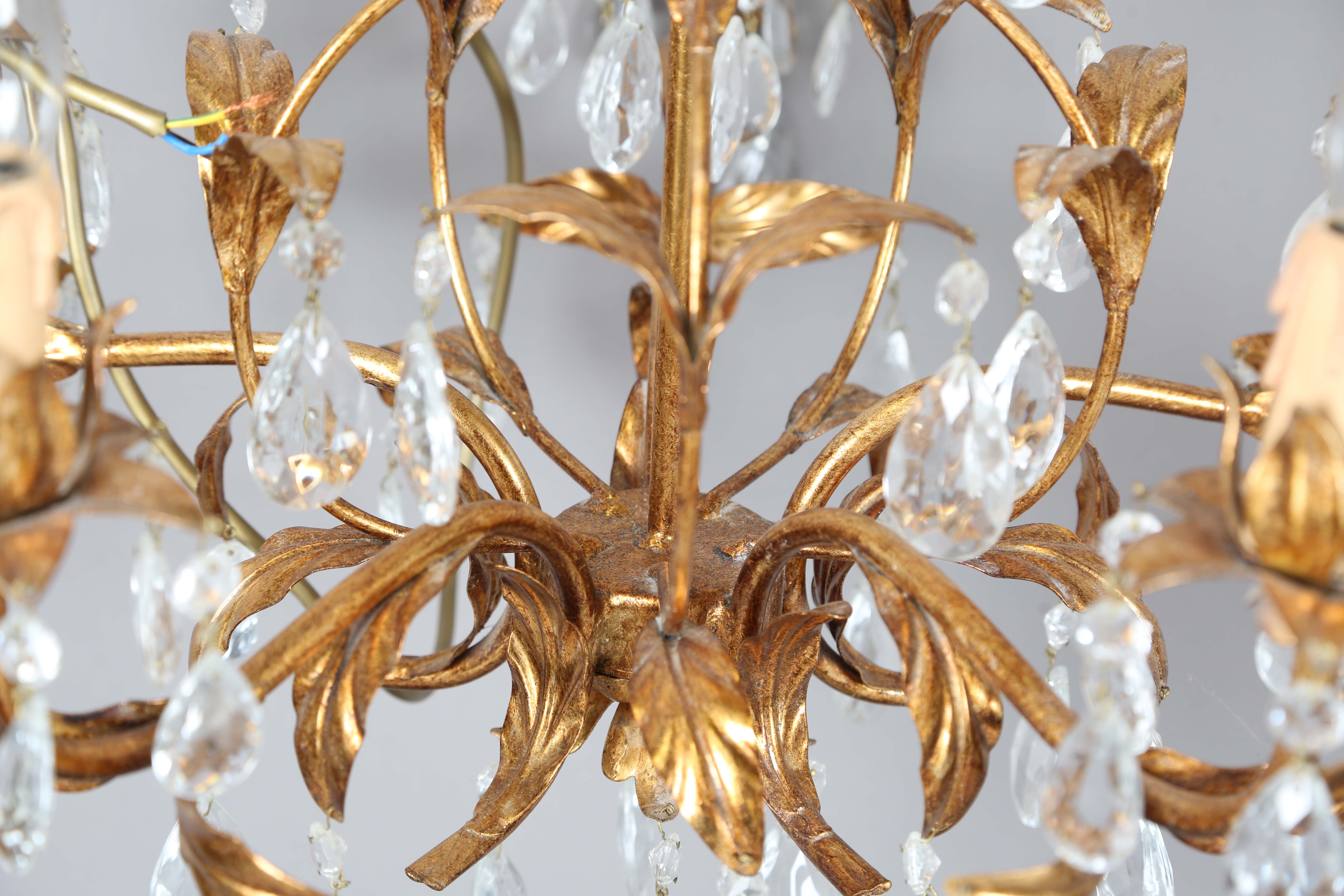 A 20th century gilt metal and cut glass five-light chandelier, height 60cm, width 55cm.Buyer’s - Image 6 of 9