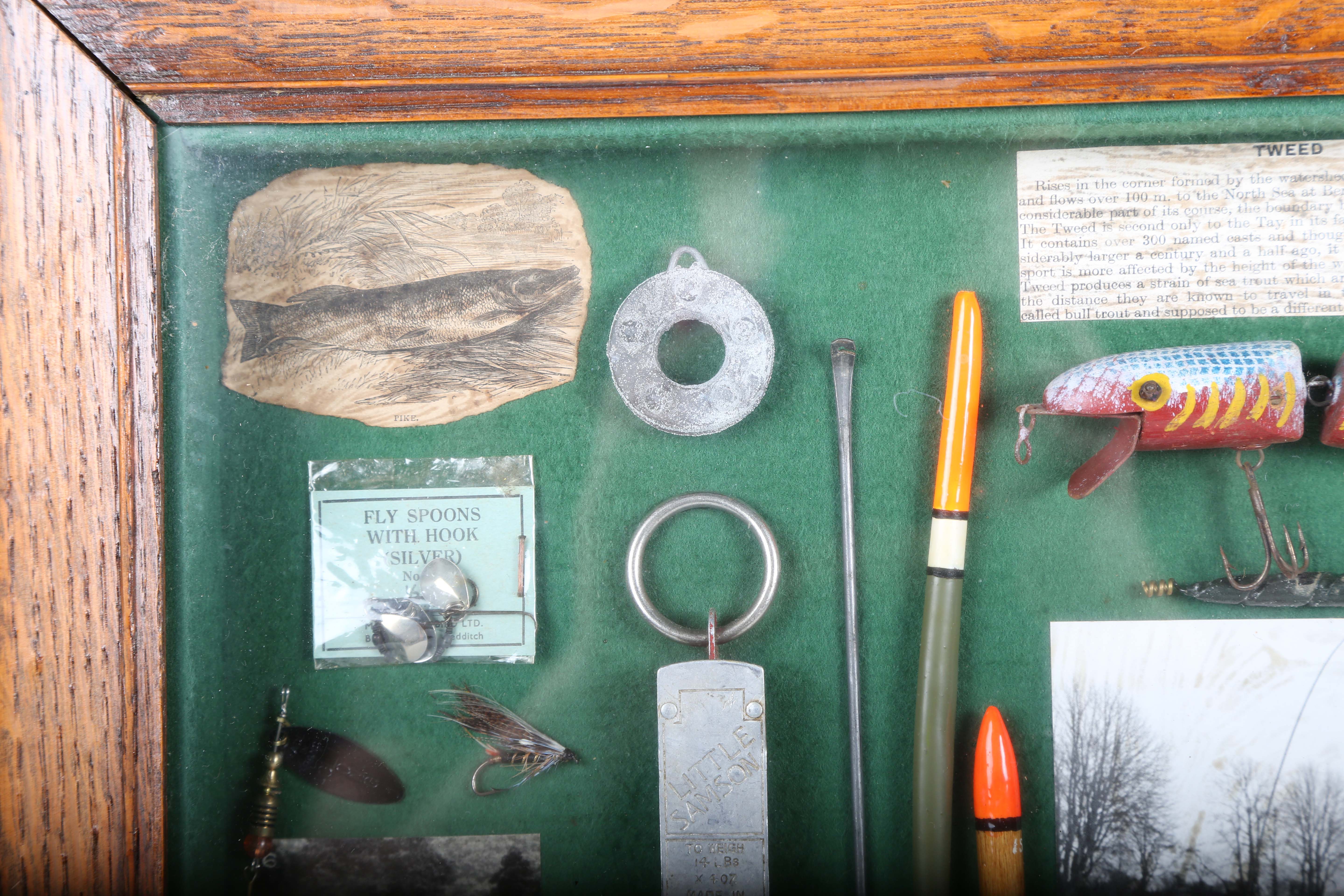 A group of fishing related items, including lures, floats, flies and hooks, all mounted for - Image 12 of 12