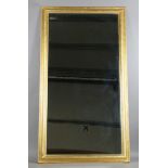 A large 19th century rectangular wall mirror with a later gilded moulded section frame and
