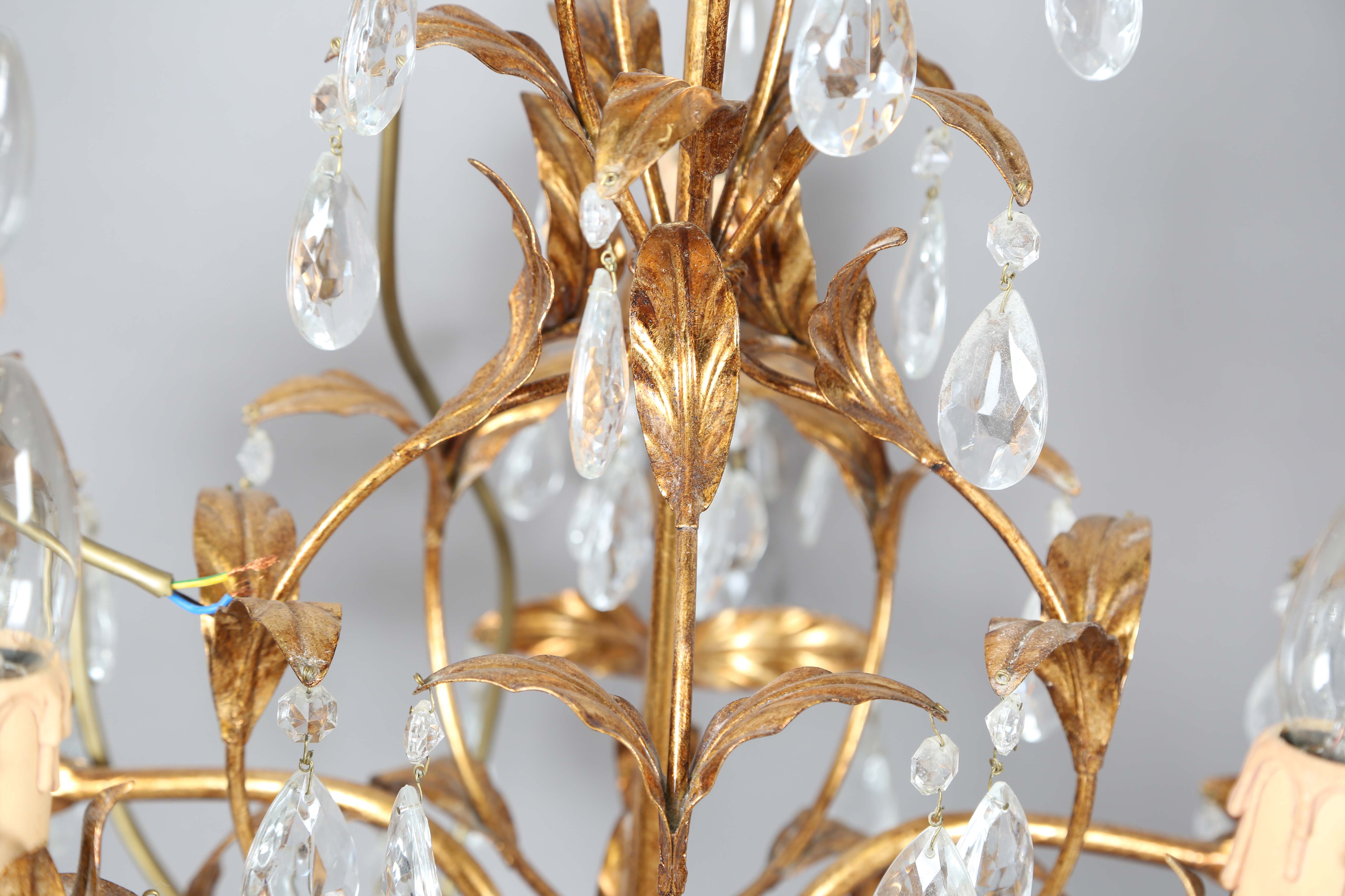 A 20th century gilt metal and cut glass five-light chandelier, height 60cm, width 55cm.Buyer’s - Image 7 of 9