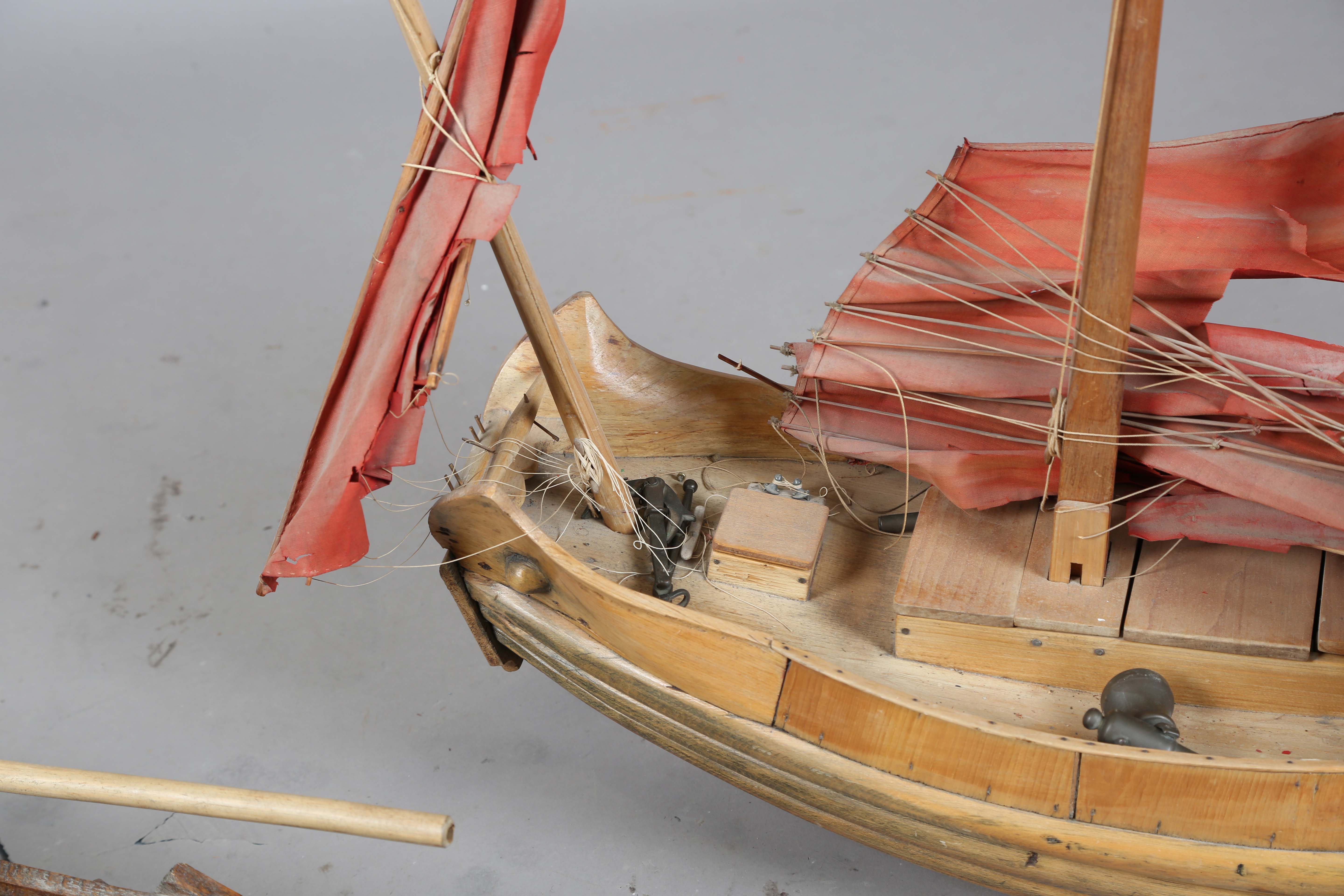 An early 20th century scratch-built softwood model of a boat, detailed with two brass cannons and - Image 10 of 13