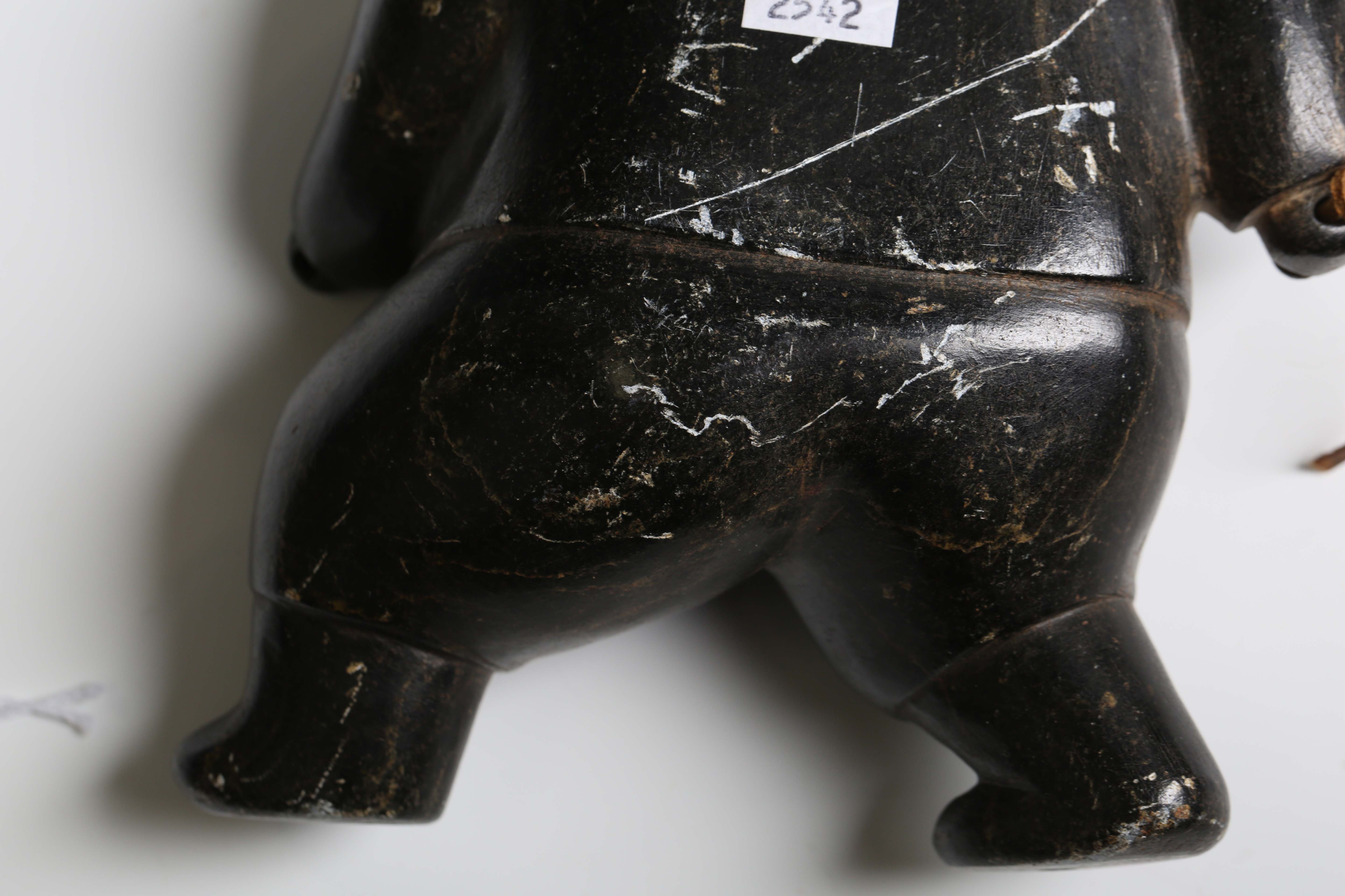 Two Inuit carved black stone figures, one modelled as an Inuit, height 19cm, the other as a - Image 2 of 13