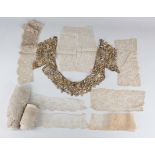 A large collection of mainly 18th and 19th century lace borders, sections and fragments.Buyer’s