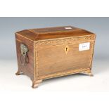 A Regency rosewood and chequer inlaid tea caddy of sarcophagus form, width 21cm.Buyer’s Premium 29.