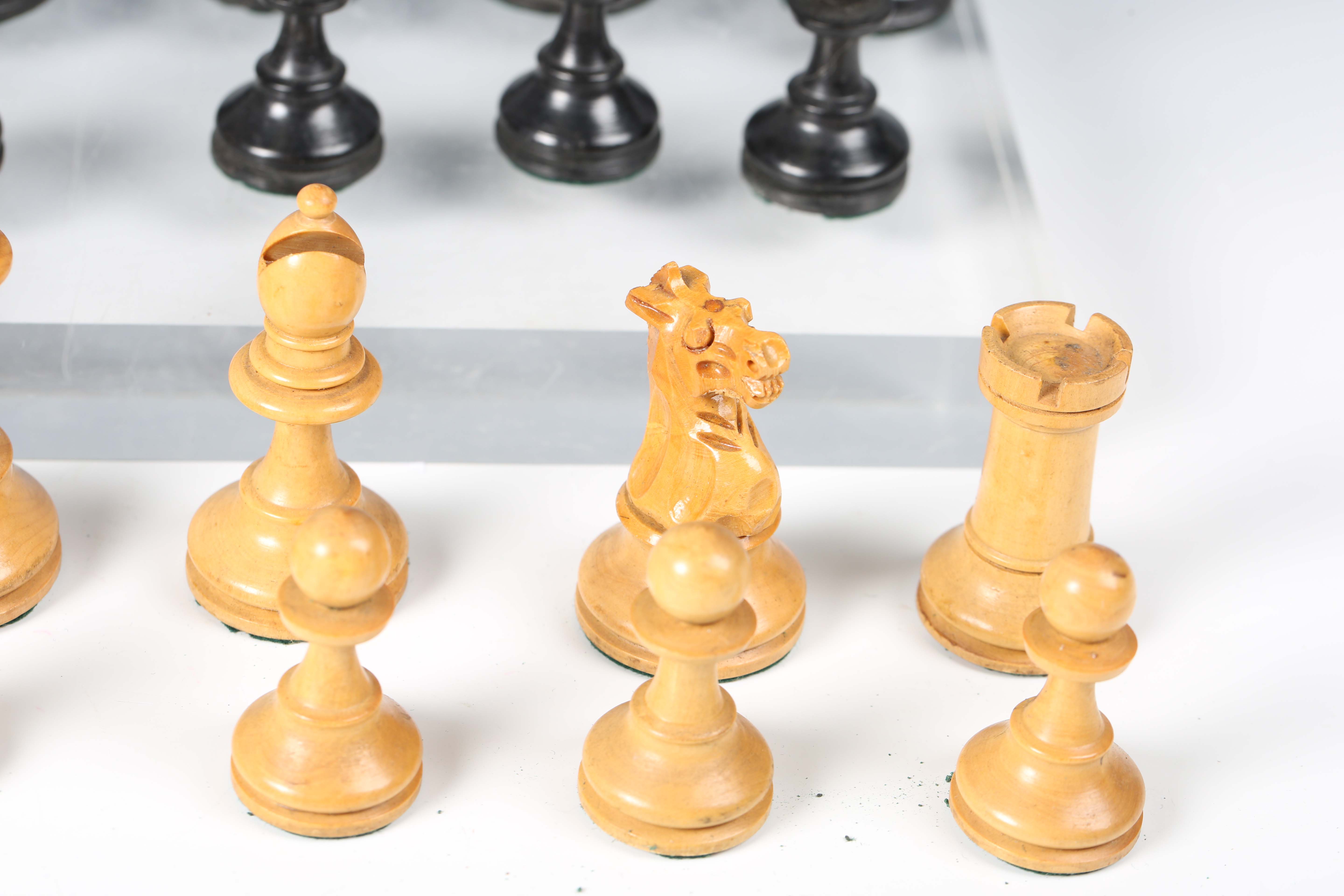 An early/mid-20th century boxwood and ebonized Staunton chess set with weighted bases, height of - Image 6 of 8
