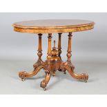 A mid-Victorian burr walnut oval centre table, the top inlaid with Tunbridge ware style panels,