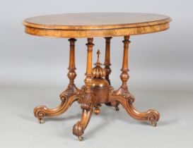 A mid-Victorian burr walnut oval centre table, the top inlaid with Tunbridge ware style panels,