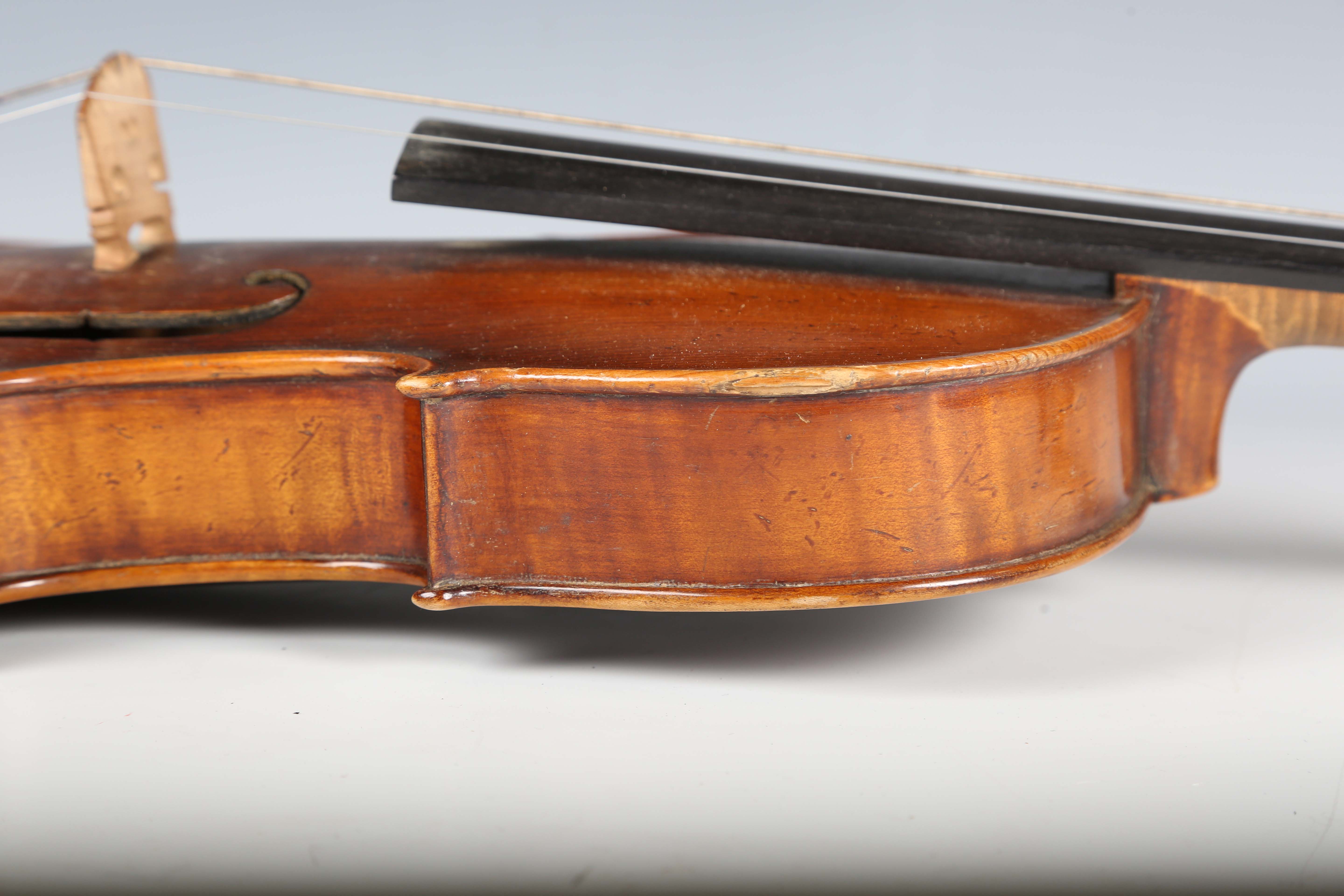 A violin with striped two-piece back, bearing interior label detailed 'Antonius Stradivarius...', - Image 6 of 24