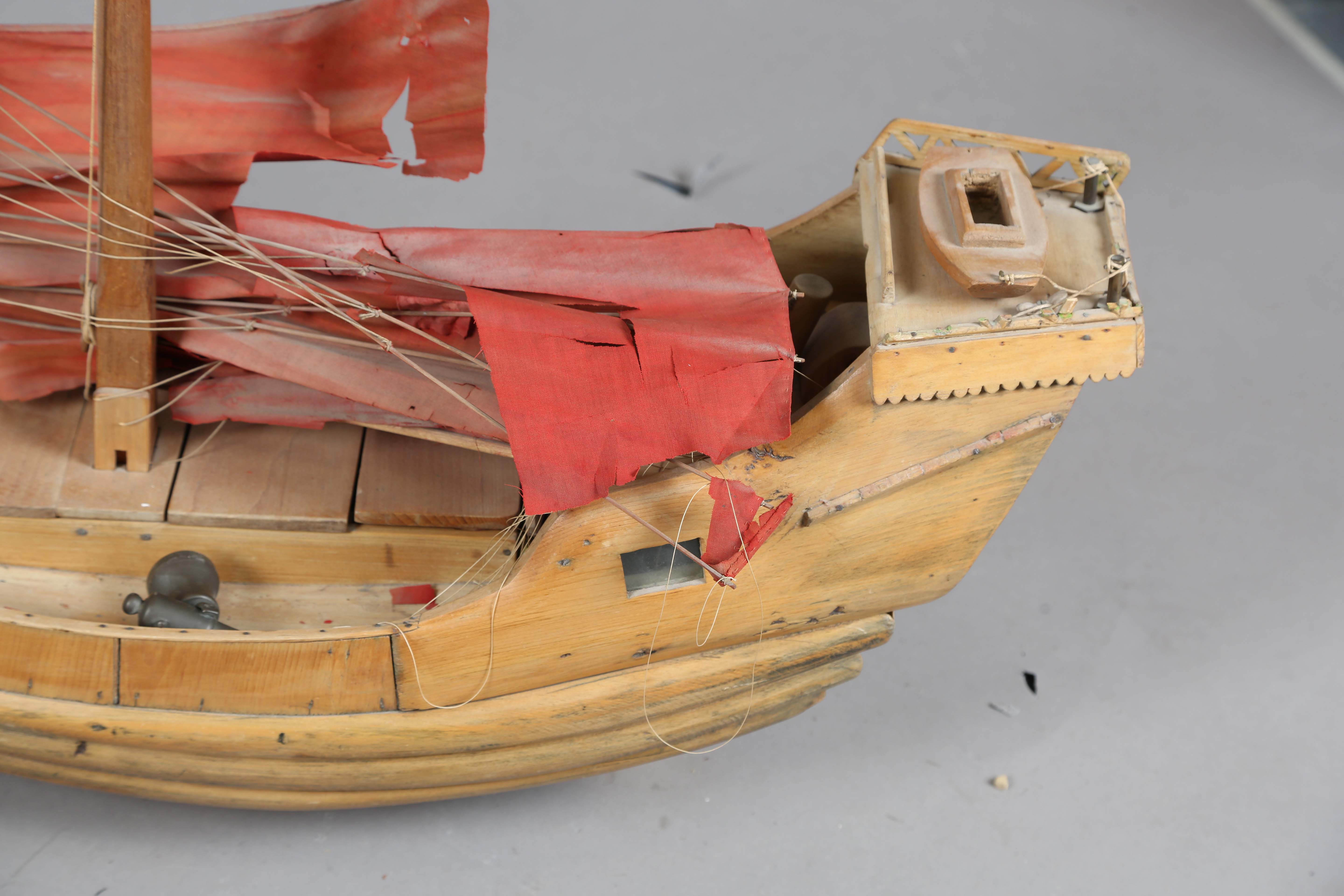 An early 20th century scratch-built softwood model of a boat, detailed with two brass cannons and - Image 11 of 13