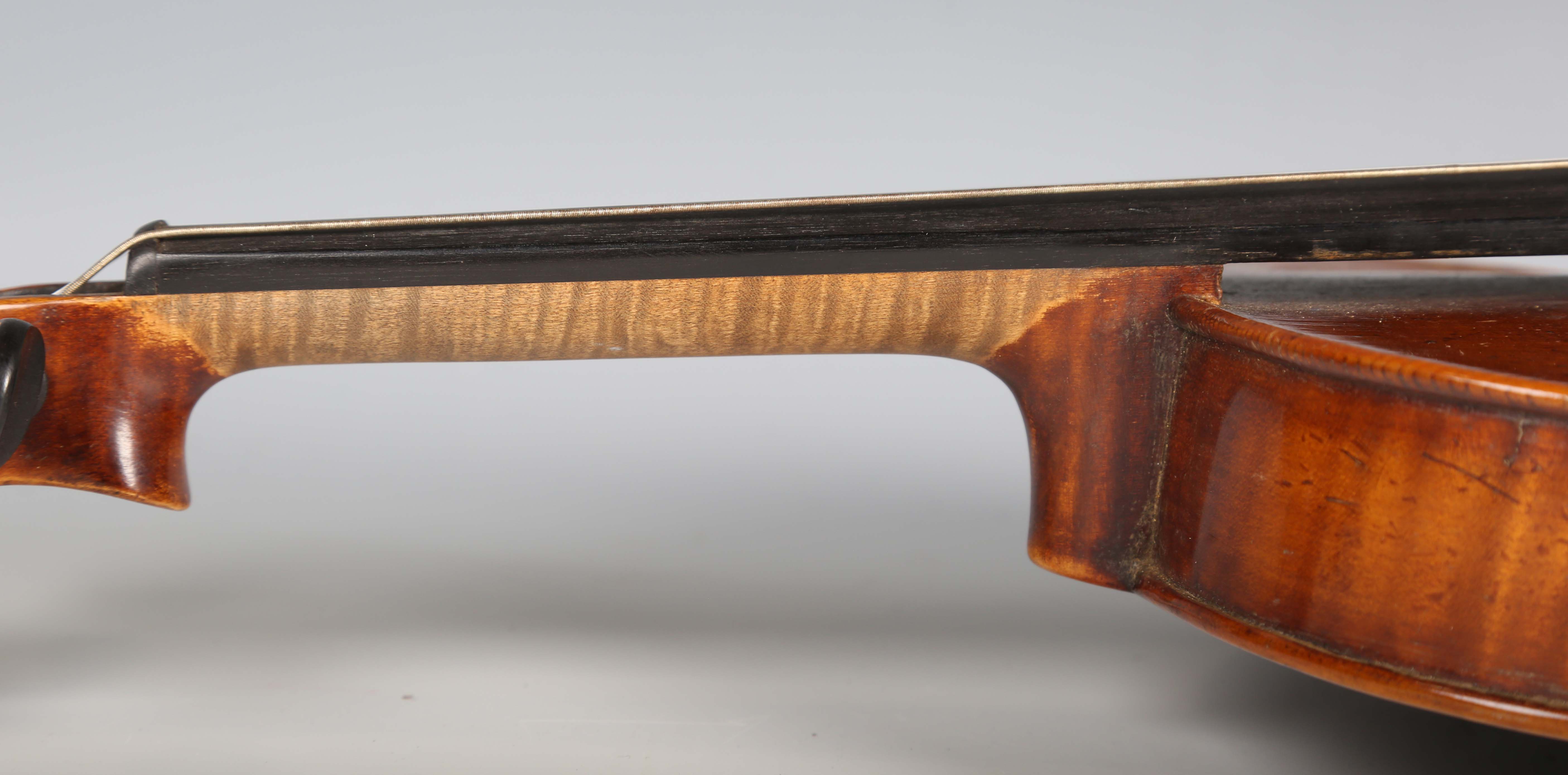 A violin with striped two-piece back, bearing interior label detailed 'Antonius Stradivarius...', - Image 18 of 24