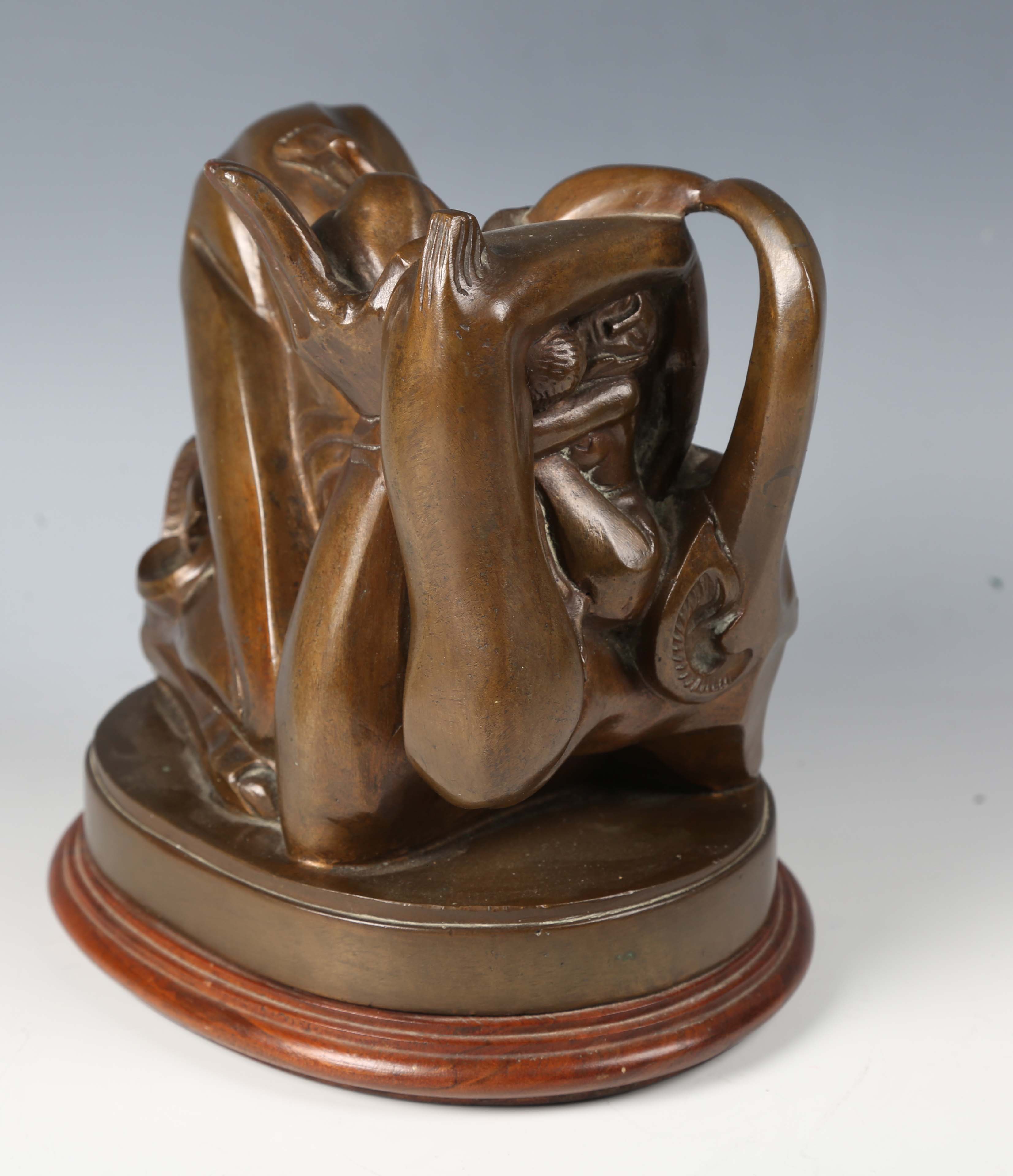A mid-20th century brown patinated cast bronze contorted figure group depicting the Devil enveloping - Image 5 of 8