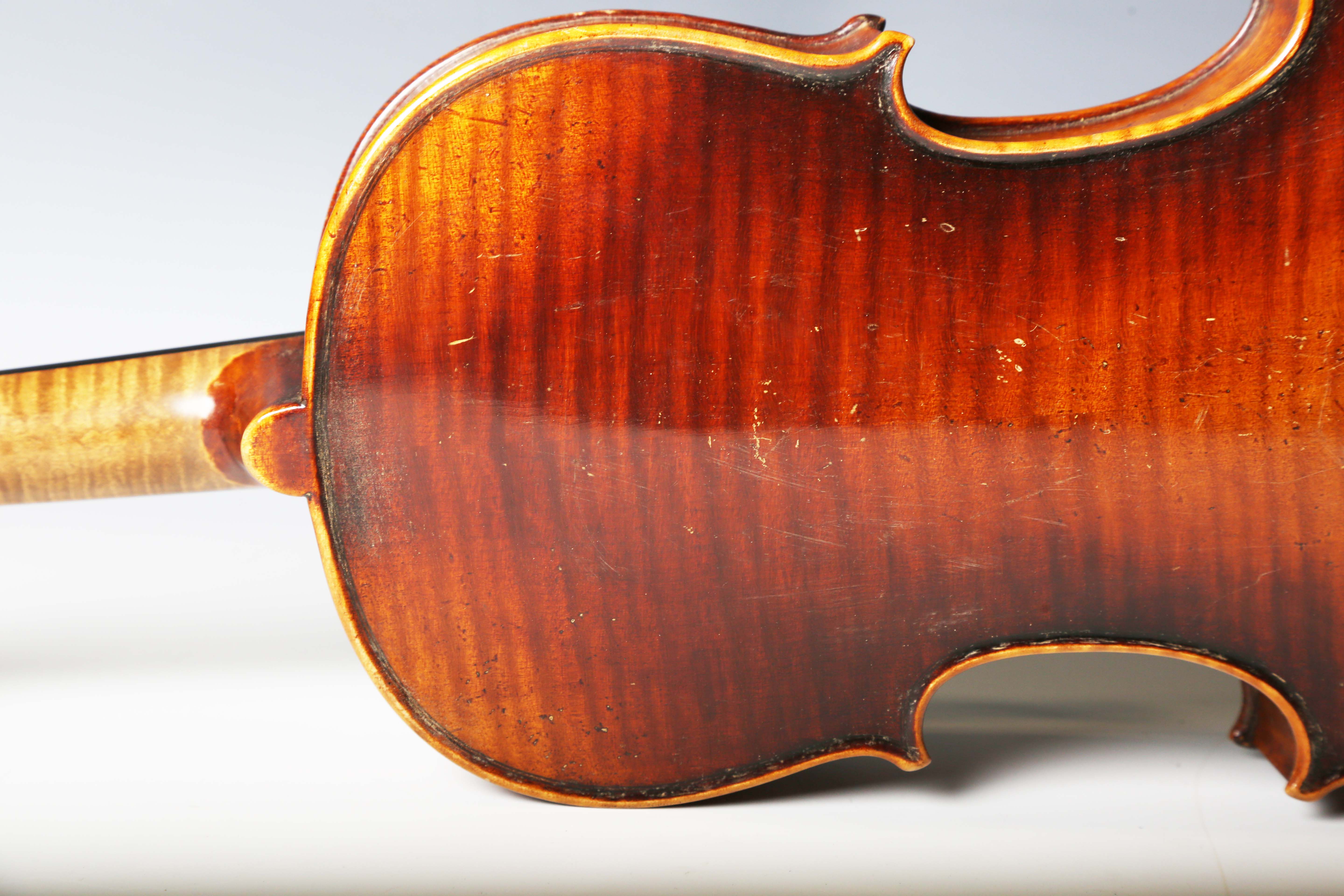 A violin with striped two-piece back, bearing interior label detailed 'Antonius Stradivarius...', - Image 11 of 24