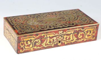 A 19th century red stained tortoiseshell and brass boulle work rectangular box with hinged lid,