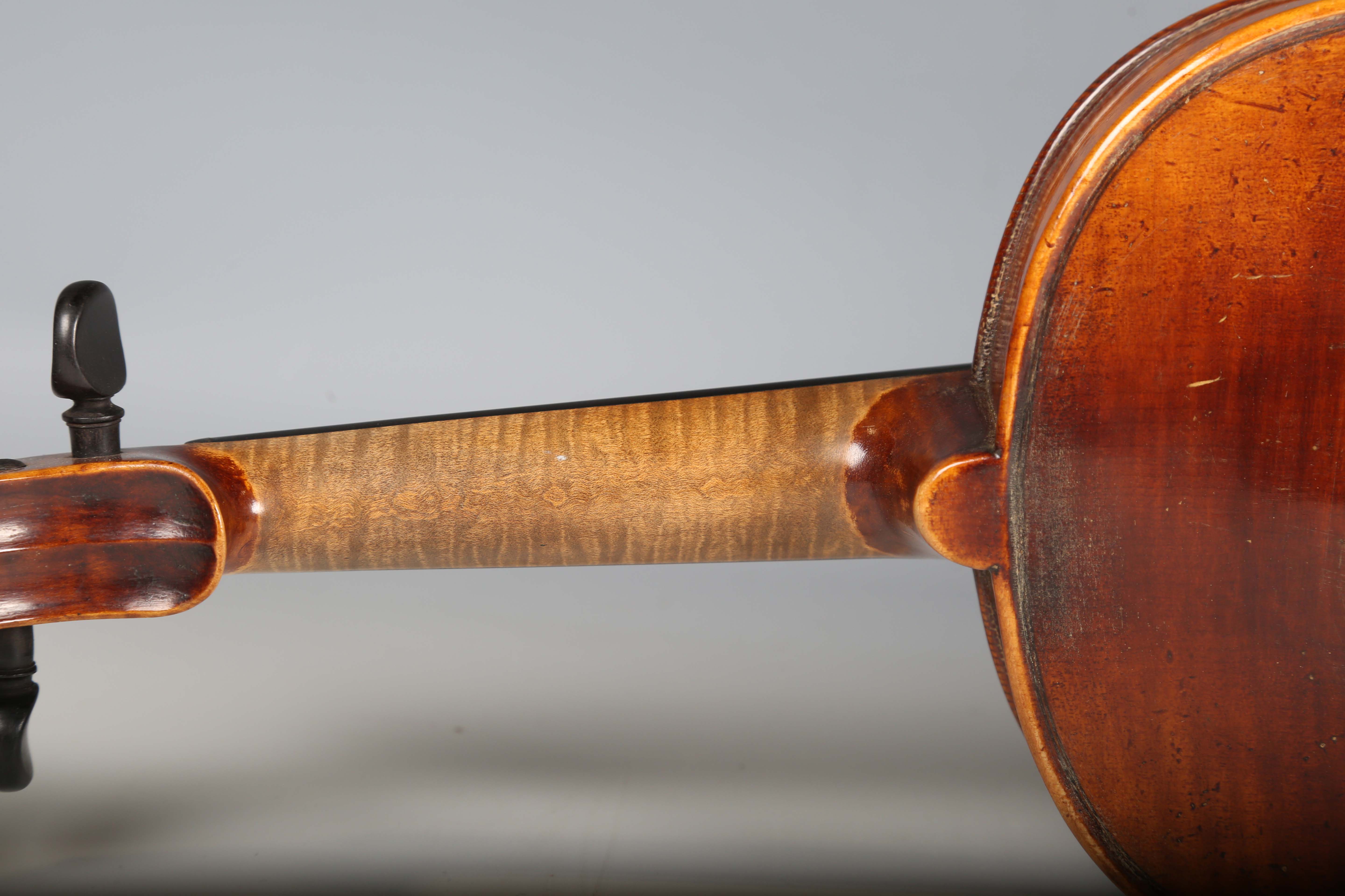 A violin with striped two-piece back, bearing interior label detailed 'Antonius Stradivarius...', - Image 12 of 24