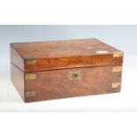 A Victorian walnut writing slope with brass mounts, width 35cm.Buyer’s Premium 29.4% (including