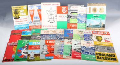 A large collection of football programmes, including FA Challenge Cup final 1962, 1963, 1964,