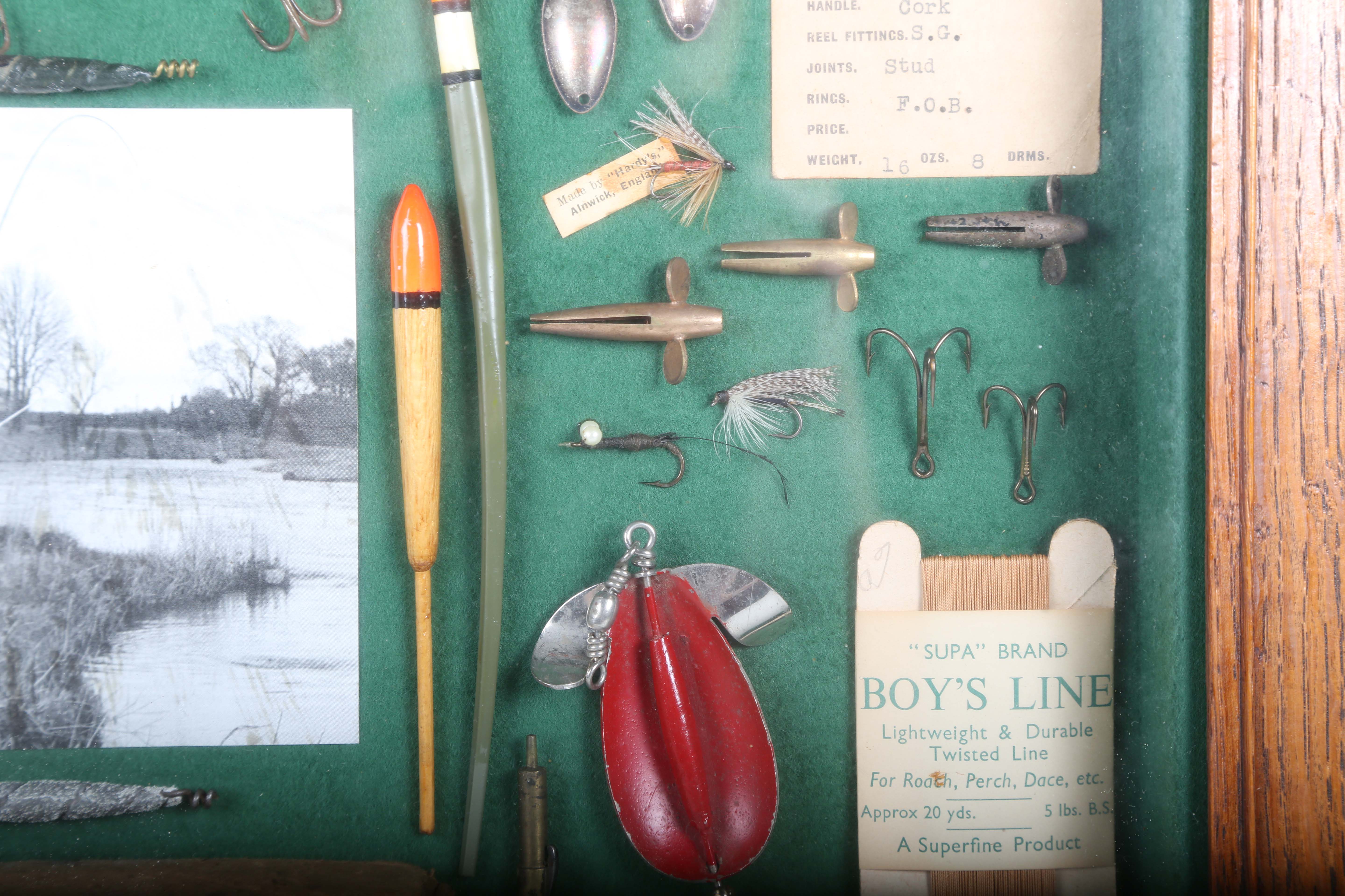 A group of fishing related items, including lures, floats, flies and hooks, all mounted for - Image 9 of 12