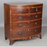 A George IV mahogany bowfront chest of drawers with pressed brass handle plates and inlaid bone