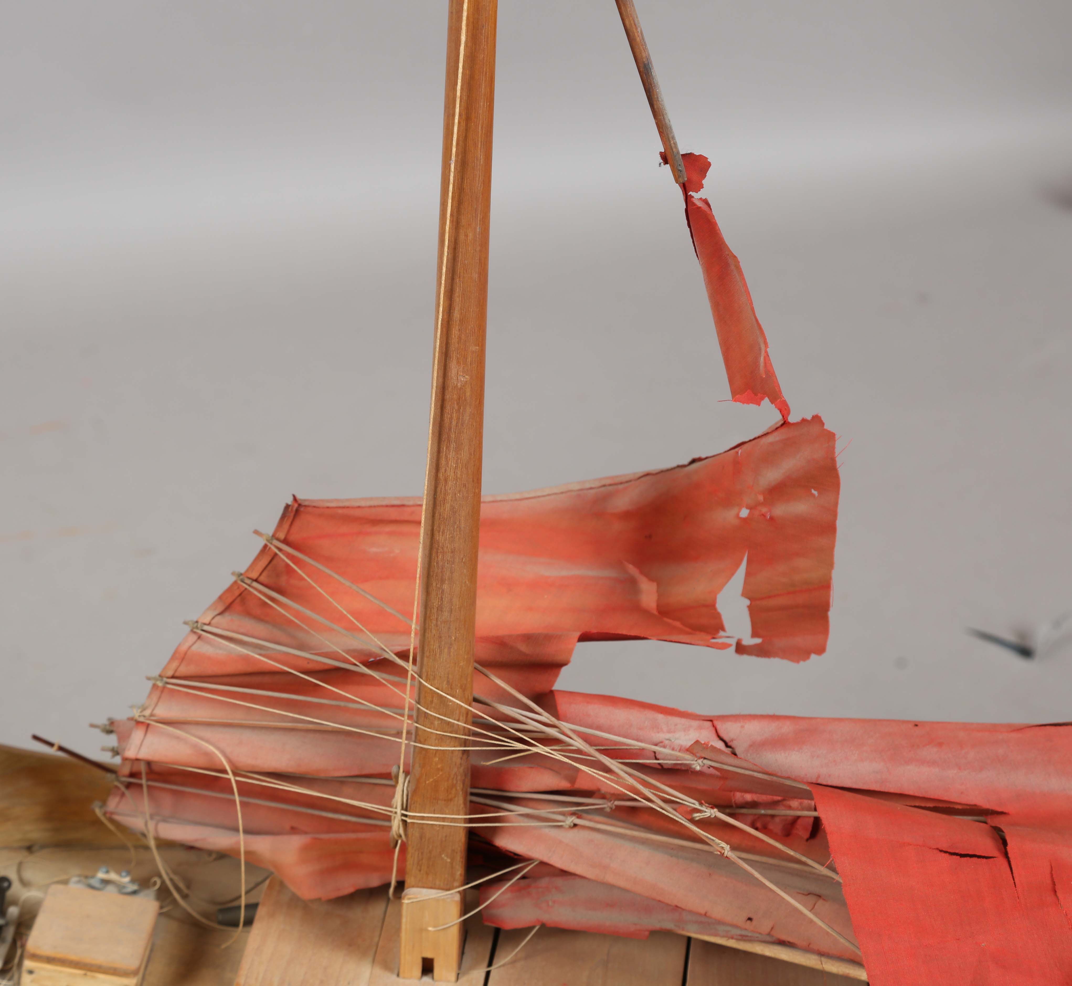 An early 20th century scratch-built softwood model of a boat, detailed with two brass cannons and - Image 12 of 13