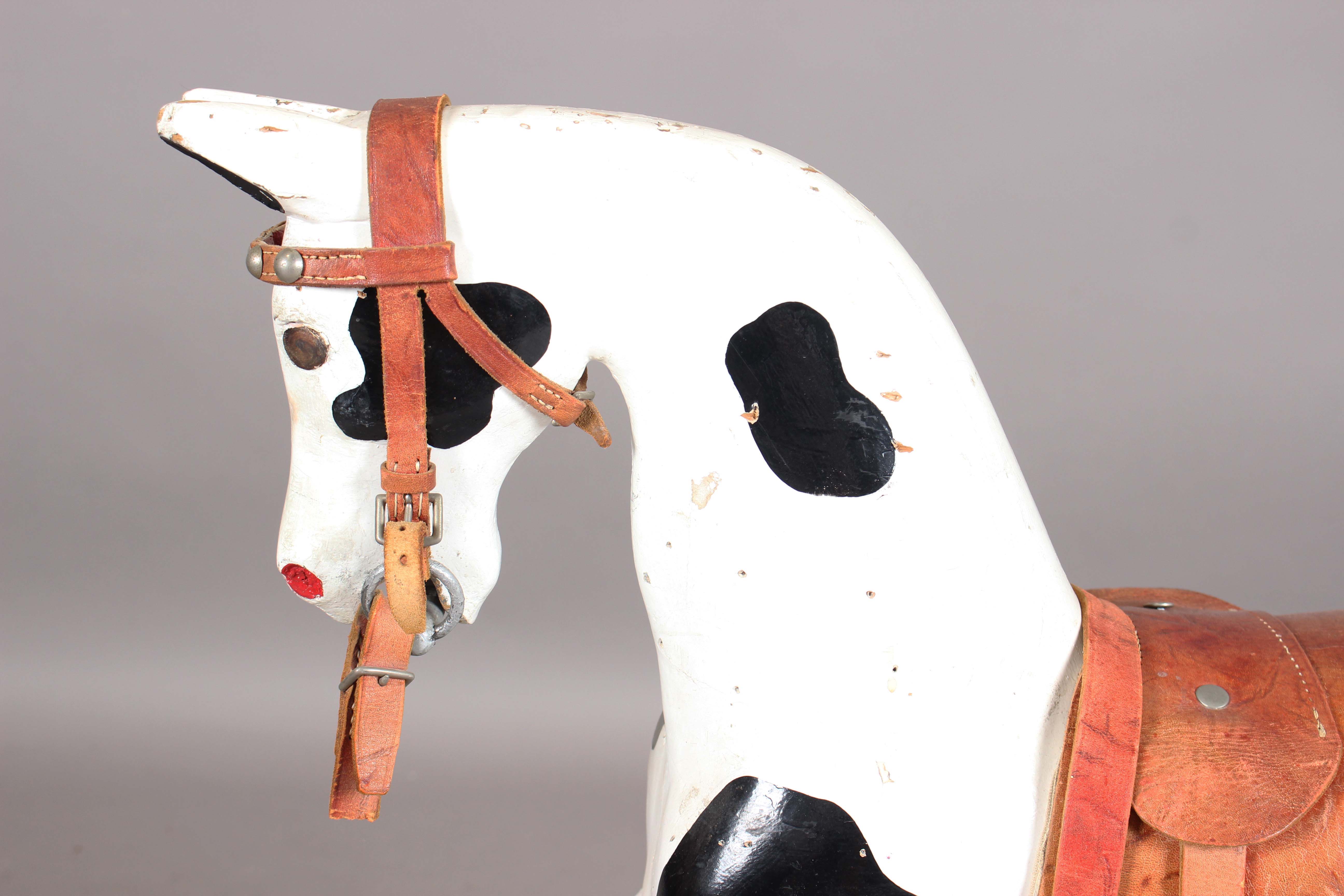 A 19th century carved and painted wooden rocking horse with later leather saddle and pine base, - Image 6 of 15